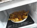 格兰仕微波炉烤箱一体机 光波炉 家用平板机械旋钮式 迷你小型20L 操作简单经典 可烧烤G70F20N2L-DG(S0) 实拍图