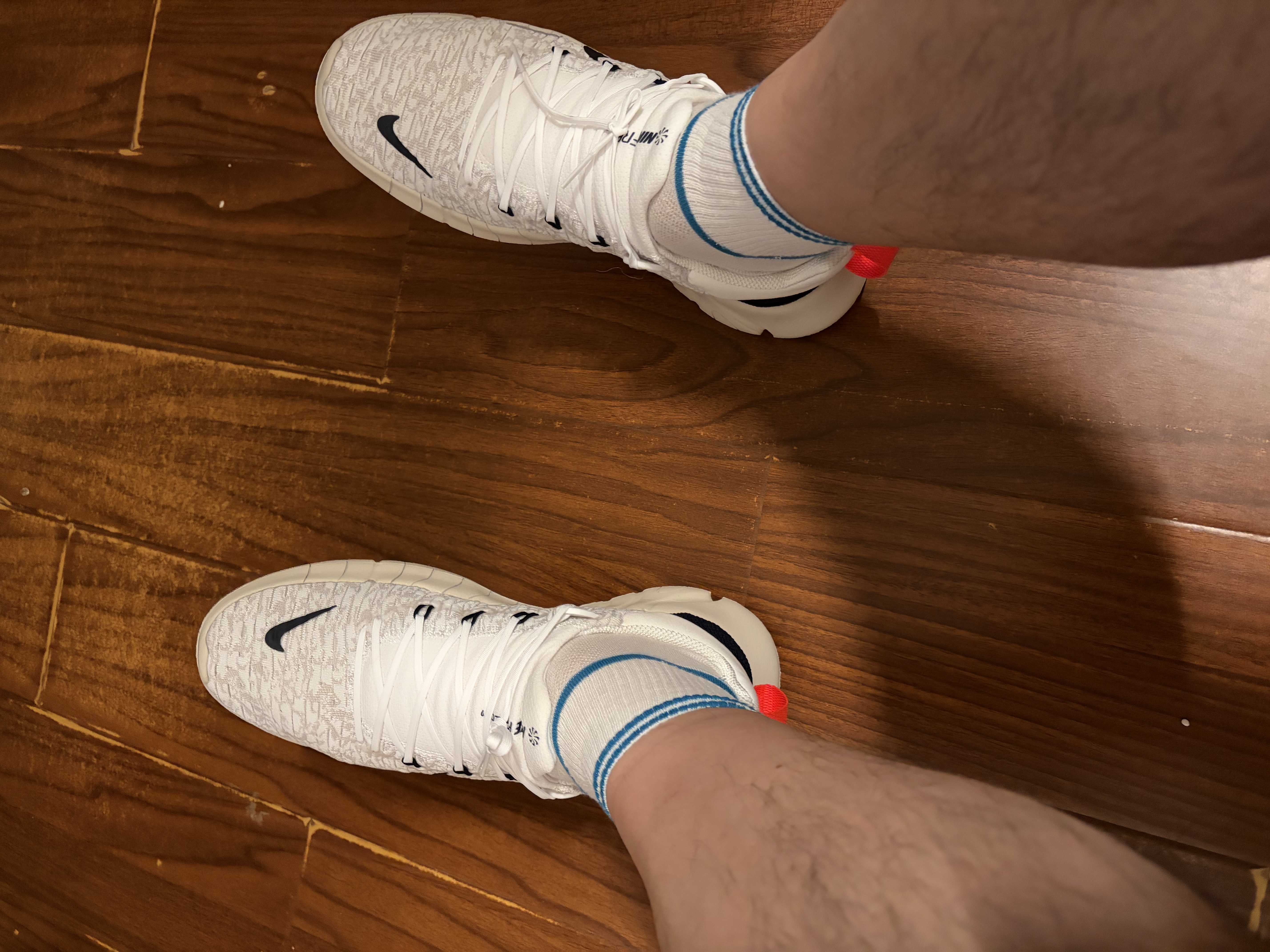 耐克NIKE男子跑步鞋赤足FREE RN 5.0新款网面运动鞋CZ1884-103白43 实拍图