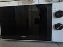 海尔（Haier）白巧不锈钢微波炉 0涂层360°转盘加热 旋转操作易洁耐用内胆 家用小型 老人适用 HW-M2003JW 实拍图