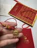 中国黄金（CHINA GOLD）黄金福字金锁项链宝宝套装足金长命平安锁吊坠婴儿金饰周岁礼物 【今/次日达】平安锁项链【红绳】约0.7g 实拍图