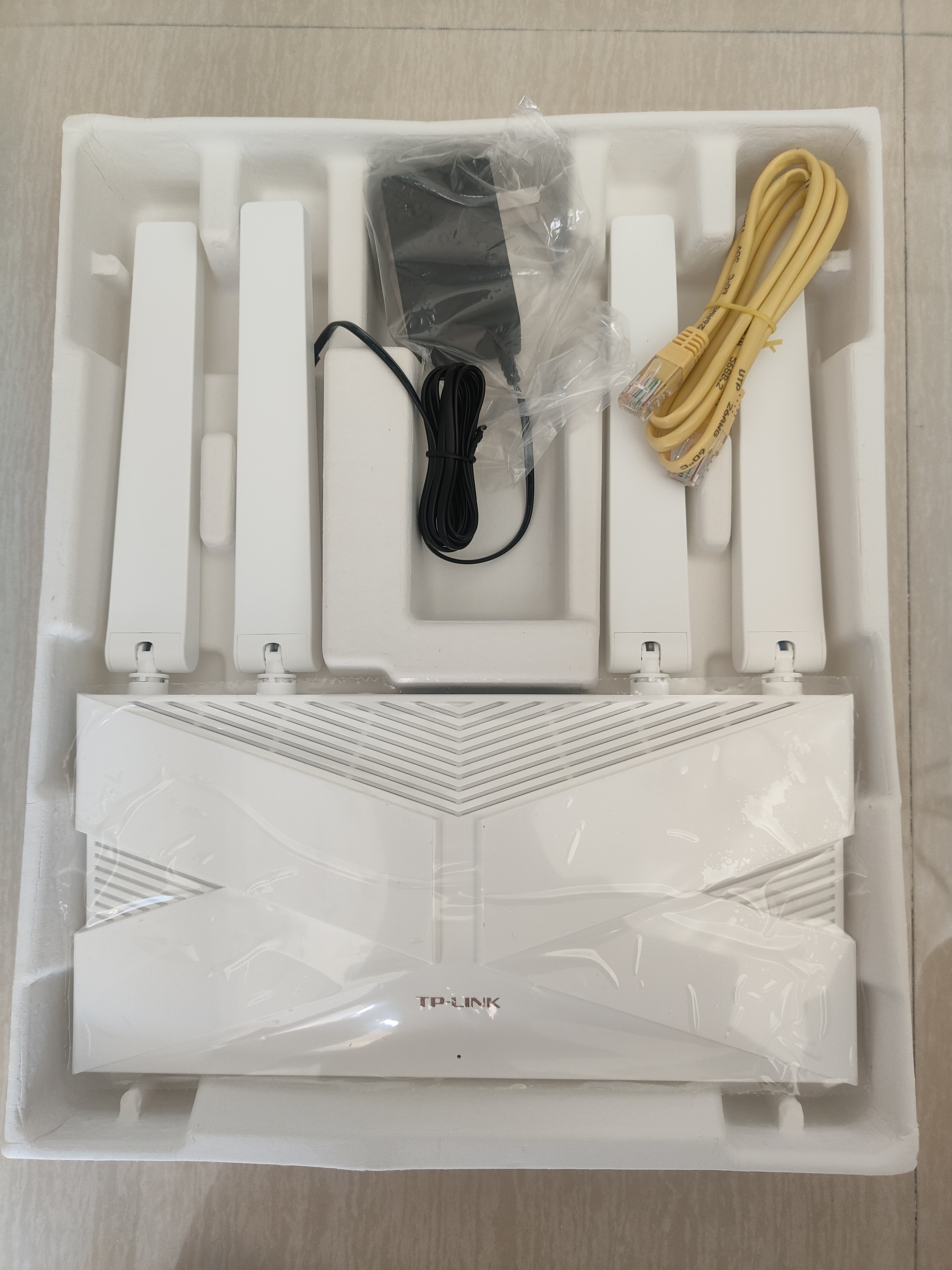 普联（TP-LINK）全屋路由器AX3000 子母路由分布式1母4子（独立包装）千兆无线双频大户型易展有线无线均可组网 实拍图