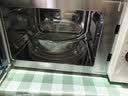 海尔（Haier）白巧不锈钢微波炉 0涂层360°转盘加热 旋转操作易洁耐用内胆 家用小型 老人适用 HW-M2003JW 实拍图