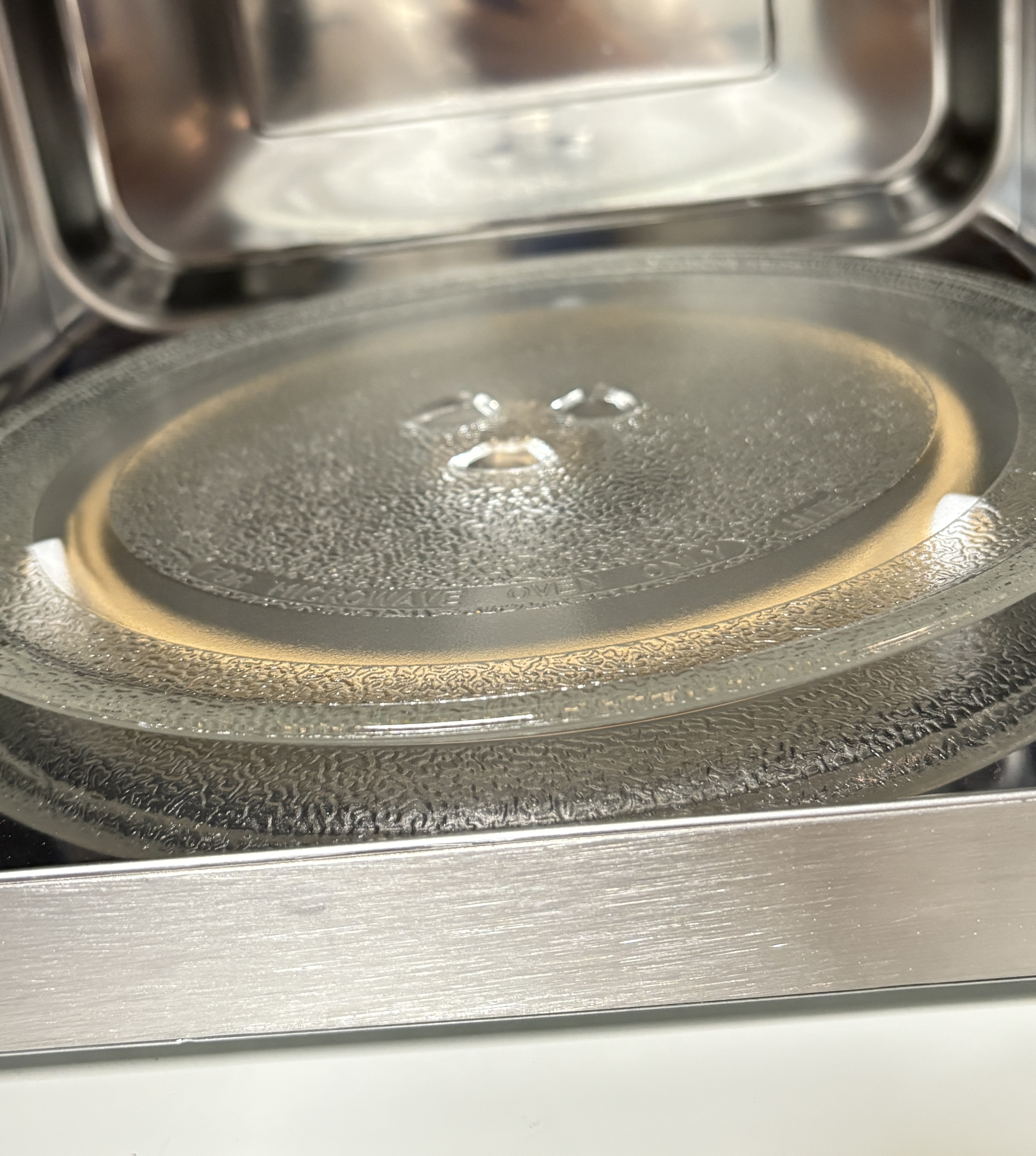 海尔（Haier）白巧不锈钢微波炉 0涂层360°转盘加热 旋转操作易洁耐用内胆 家用小型 老人适用 HW-M2003JW 实拍图