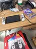 任天堂（Nintendo）【国内保税仓】Switch2/1代 OLED/续航加强日版/港版便携家用ns体感游戏机掌机 港版OLED白色+宝可梦紫 实拍图