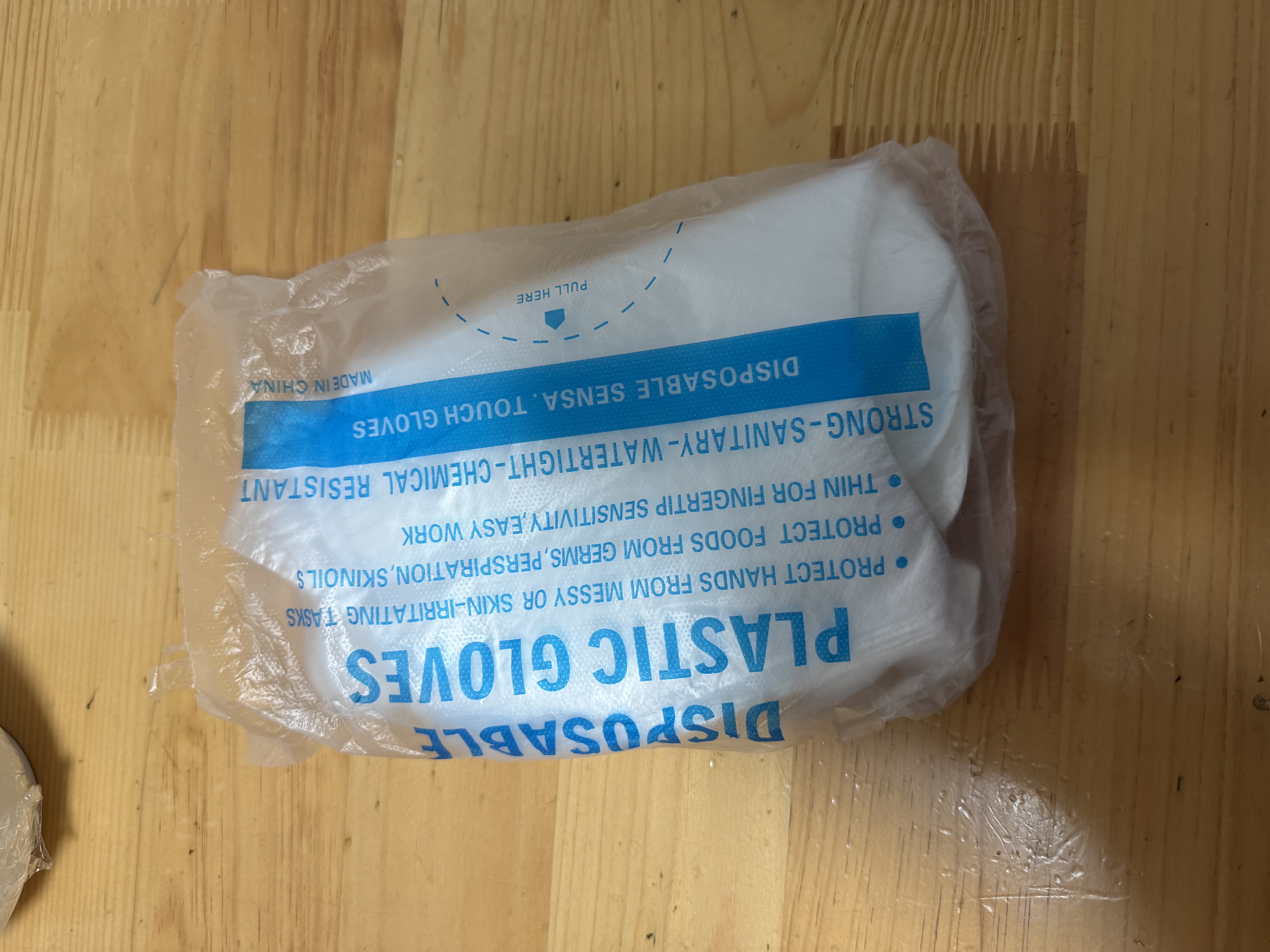 洁比世一次性手套200只加厚款食品用抽取式塑料PE防漏家用厨房透明烘焙 实拍图