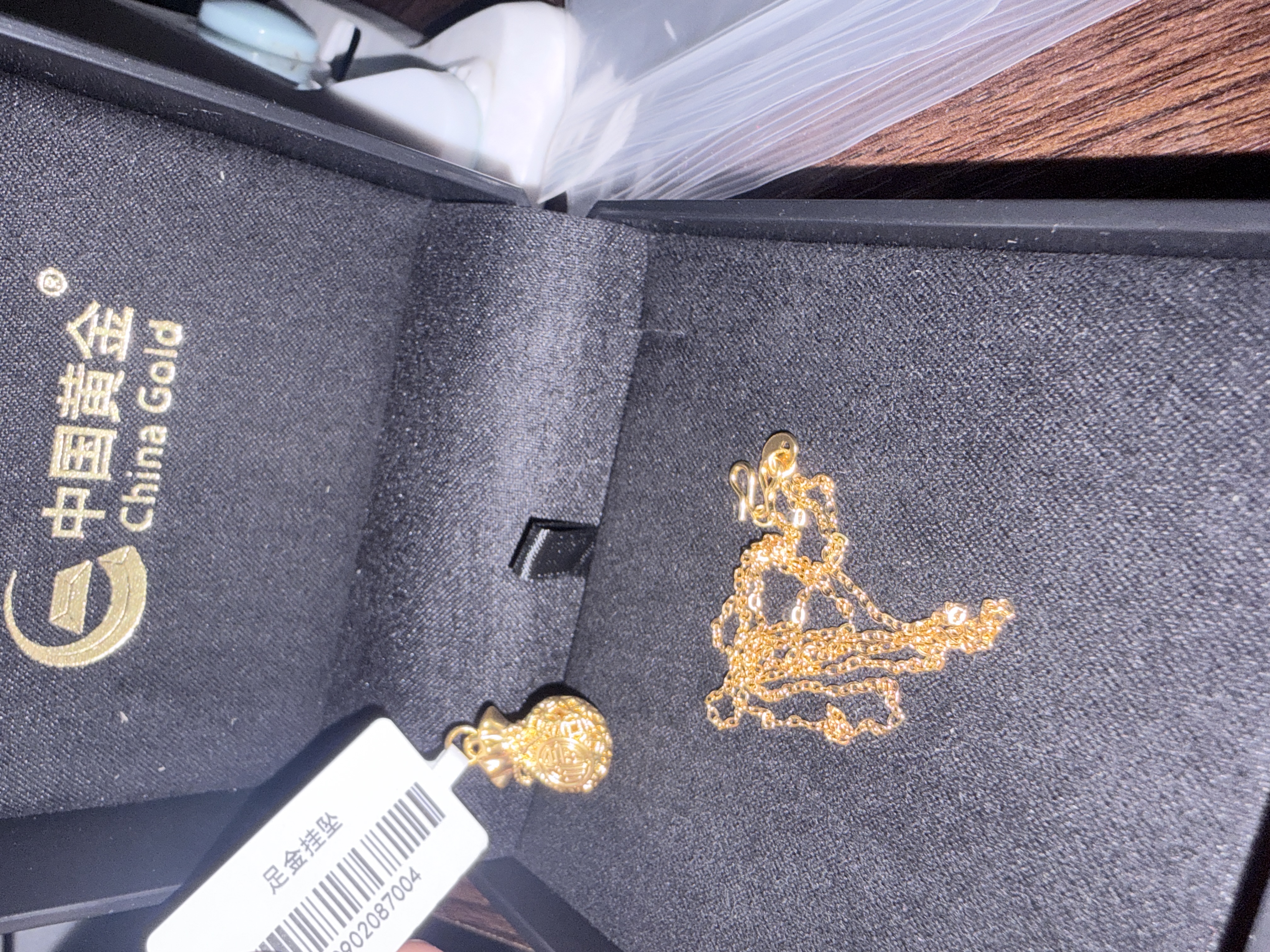 中国黄金（CHINA GOLD）黄金项链女士足金福袋吊坠挂坠生日中秋节礼物送女朋友老婆 足金吊坠约1.0g*赠镀金色银链【甄选礼盒】 实拍图