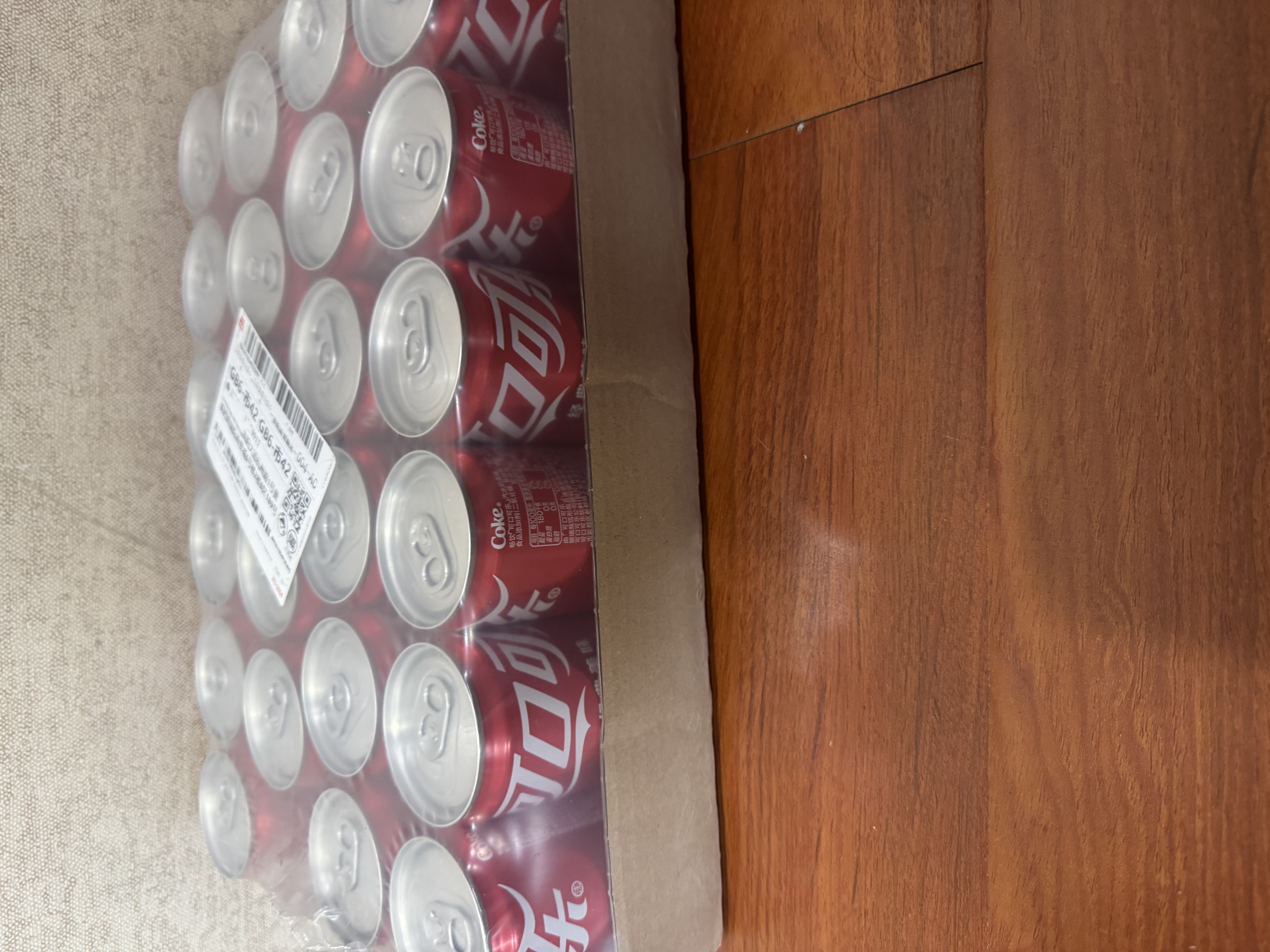 可口可乐（Coca-Cola）汽水 碳酸饮料 200ml*24罐  迷你摩登罐 新老包装随机发货 实拍图