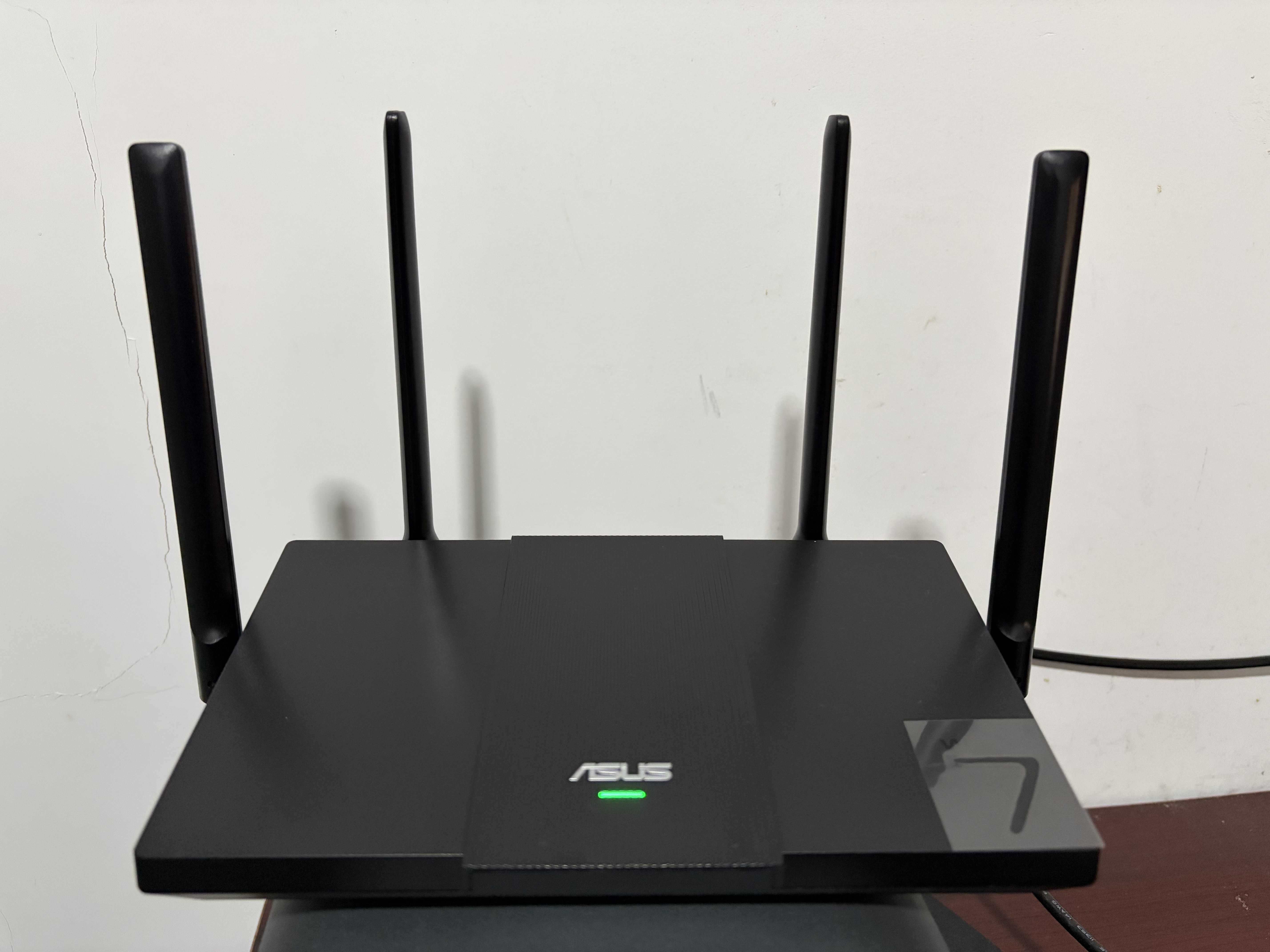 华硕（ASUS）RT-BE57 WiFi7电竞游戏加速路由器家用无线千兆路由全屋WiFi7信号增强放大器2.5g口Aimesh随心组网 实拍图