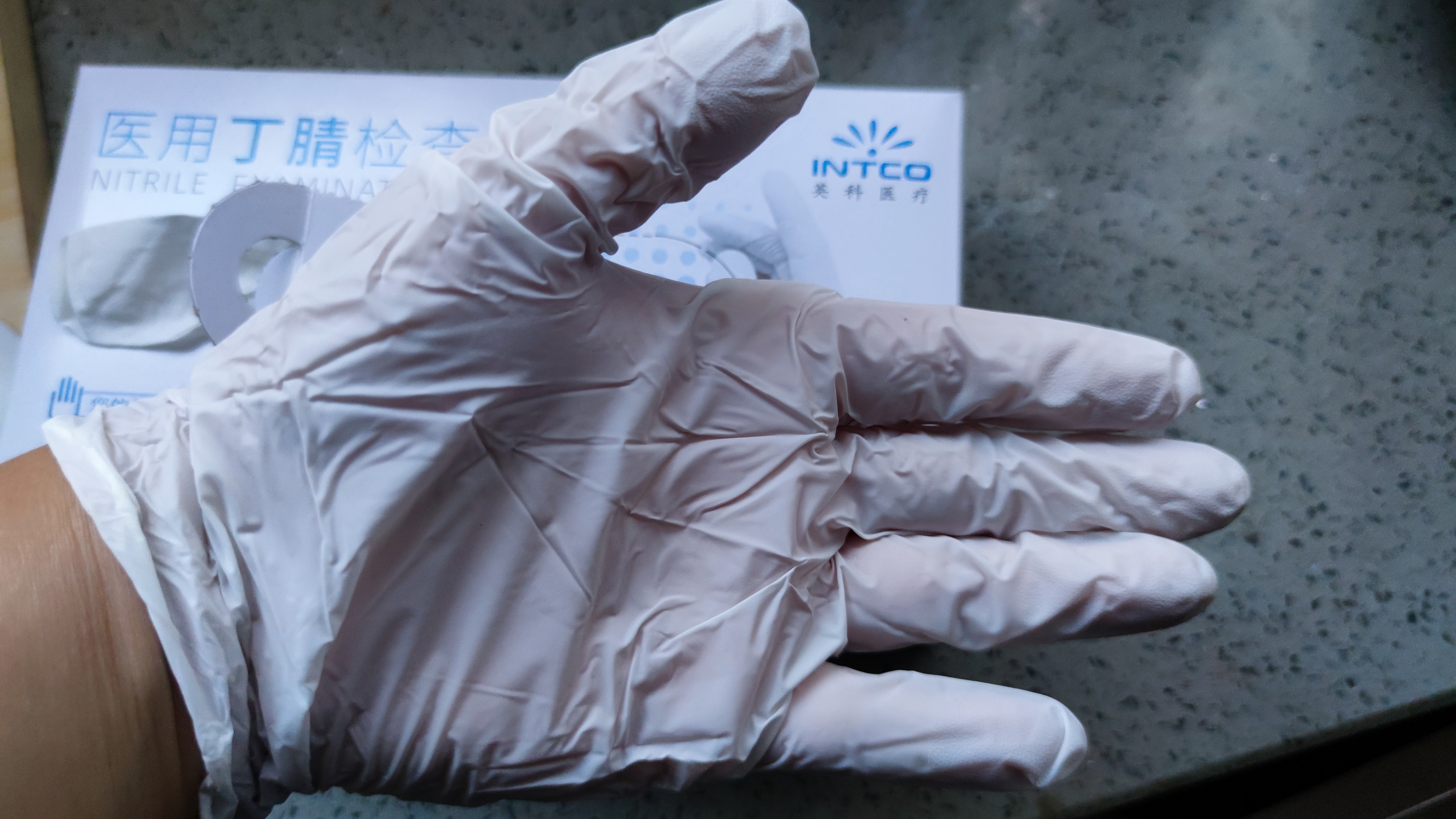 英科医疗（INTCO）一次性手套丁腈手套100只特大码牙科厨房家务防护白色丁晴手套 实拍图