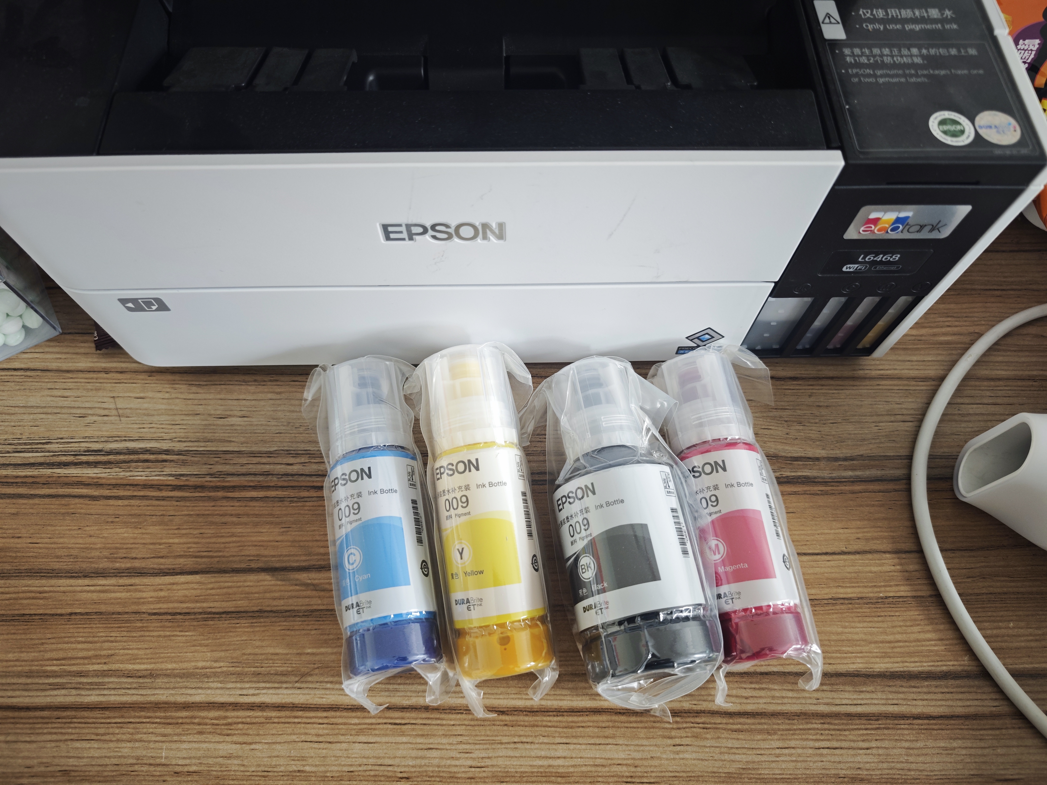 爱普生（EPSON）原装墨水009四色套装（适用L15158 L15168 L6468 L6498 L6558 L6578 L15188) T06E1-4 墨水 实拍图
