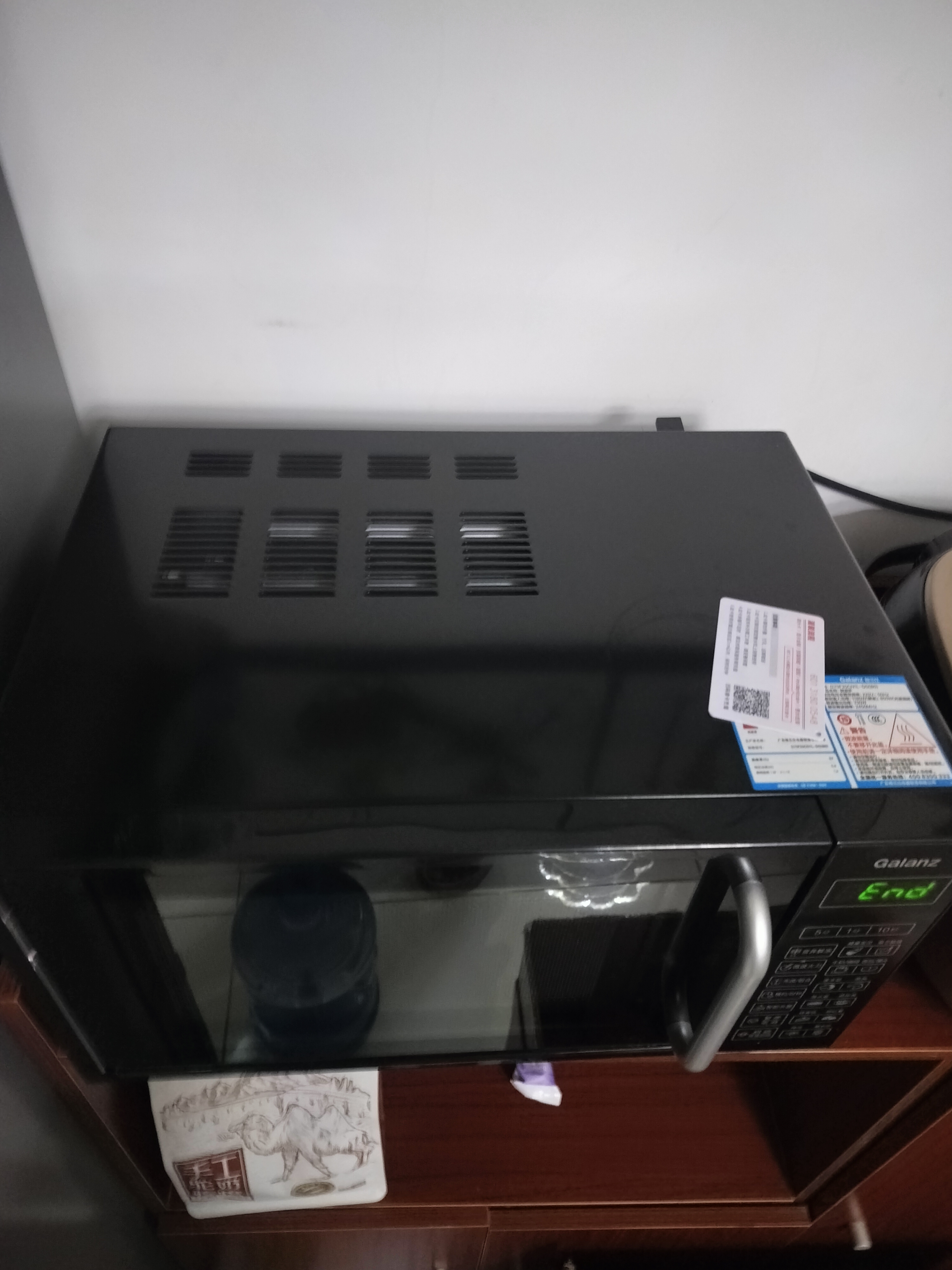 格兰仕（Galanz）微波炉烤箱一体机光波20L家用700W节能平板易清洁智能菜单多功能小型烧烤解冻预约 2026新款 DG 全新机器 实拍图