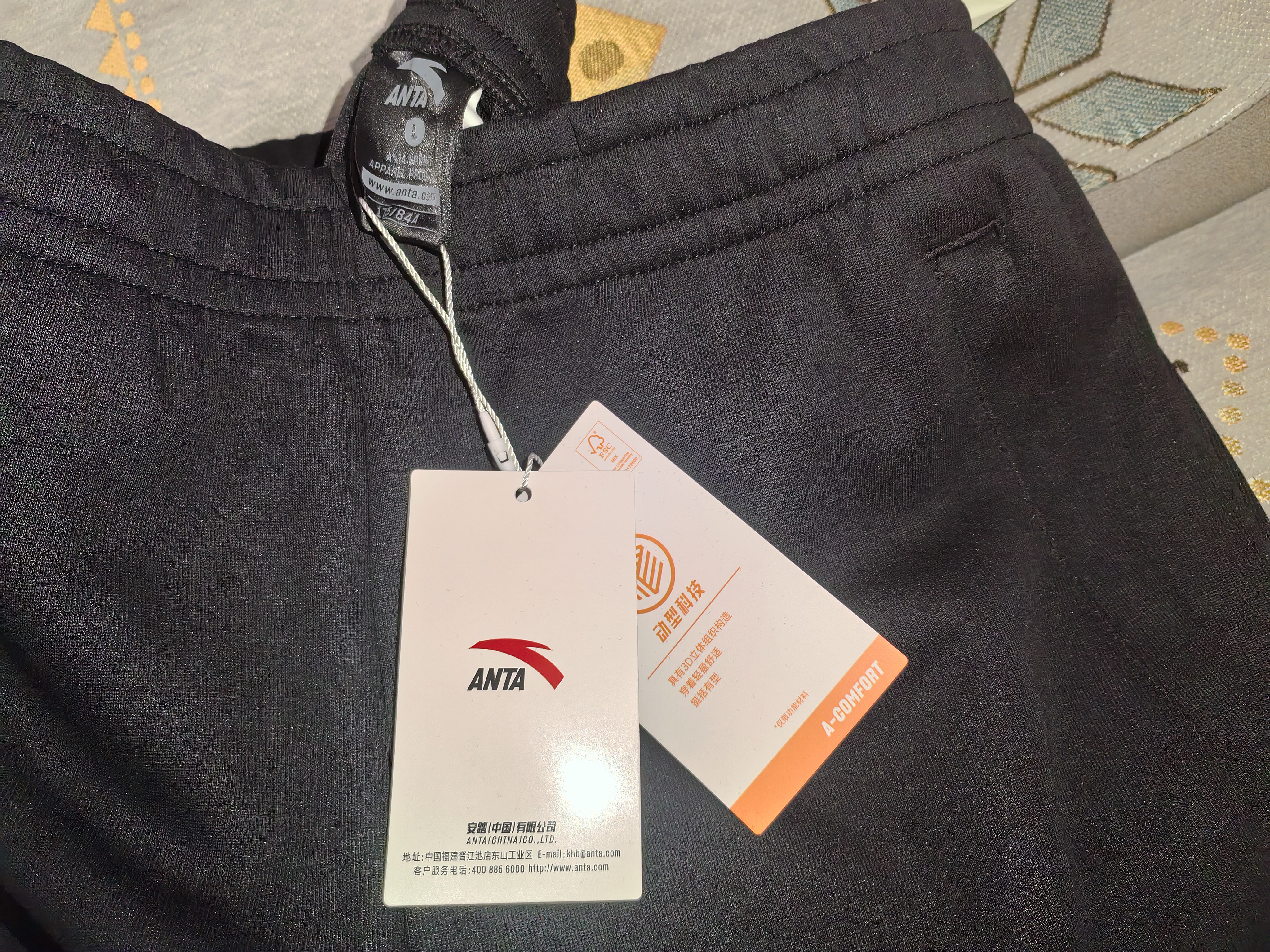 安踏（ANTA）运动裤男抗皱卫裤秋季百搭长裤子休闲裤通勤显瘦直筒四季针织裤 【直筒平口】黑色7305-1 拉链口袋 L (175) 建议120-140斤 实拍图