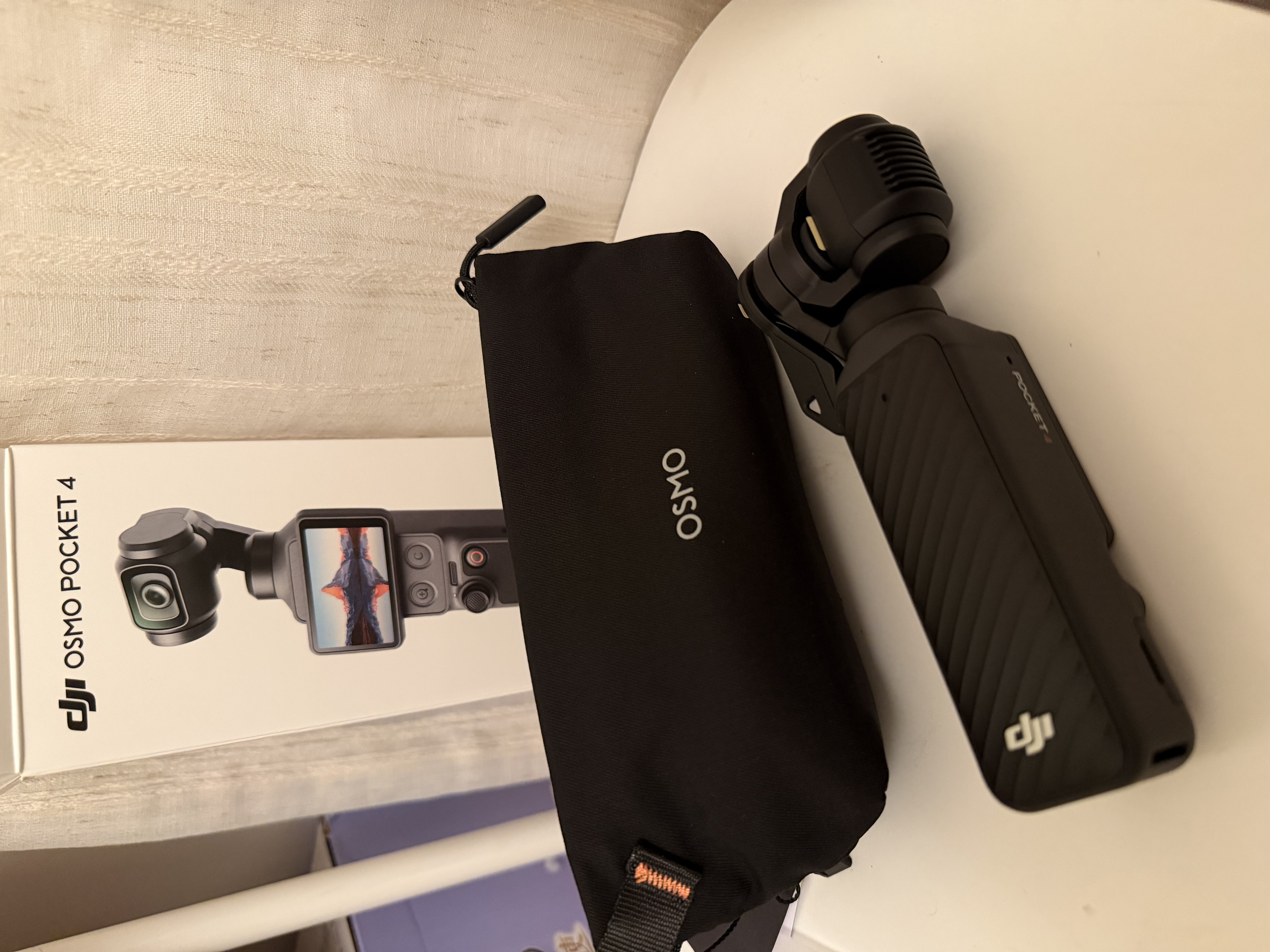 大疆 DJI Osmo Pocket 4 一英寸口袋云台相机 OP灵眸手持数码相机 旅游vlog 便携美颜摄像 标准套装 晒单实拍图