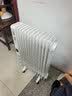 美的（Midea）【品质推荐】电热油汀取暖器/电暖器/电暖气家用/烤火炉/13片节能速热油酊/加热器/烘衣加湿HYX22N 实拍图