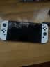 任天堂（Nintendo）【国内保税仓】Switch2/1代 OLED日版/港版游戏机续航加强版ns体感掌机便携家用主机 OLED日版白色64GB（赠2年共享会员）保税仓 实拍图