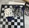 友邦（UB） 国际象棋黑白色磁性可折叠便携培训教学用棋露营(中号) 实拍图