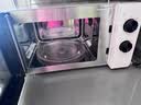 海尔（Haier）白巧不锈钢微波炉 0涂层360°转盘加热 旋转操作易洁耐用内胆 家用小型 老人适用 HW-M2003JW 实拍图