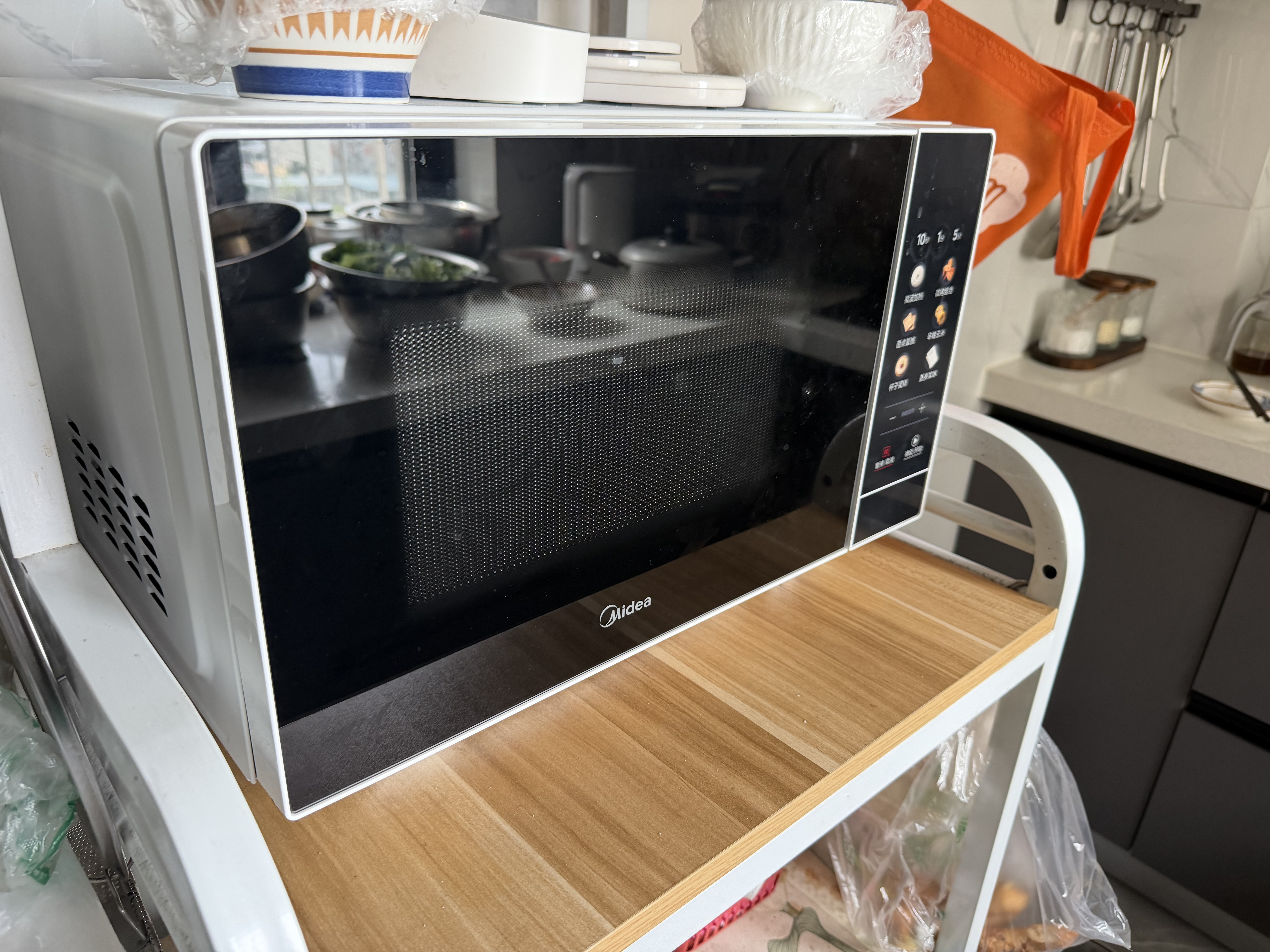 美的（Midea）微波炉烤箱一体机900w微波1000w烧烤平板光波速热23L容量变频2026新款彩膜家用一级能效 （C32） 实拍图