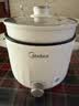 美的（Midea）电煮锅 泡面火锅宿舍小电锅 电蒸锅 多功能家用电热锅 2.6L蒸煮一体 小型2-3人用 配带蒸笼XZE2076 实拍图