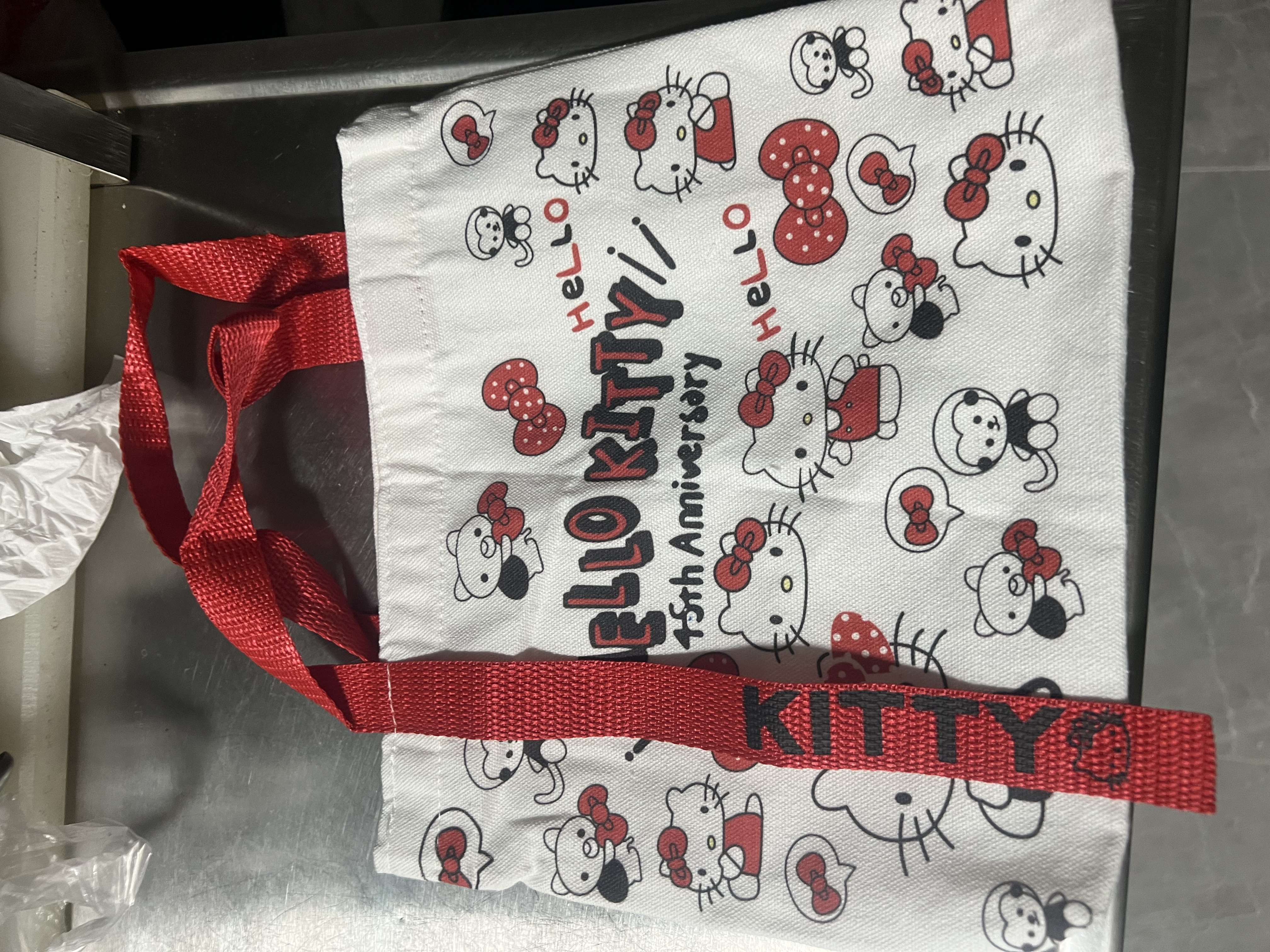 卡通蝴蝶结新款日系极简帆布包单肩上课通勤耐磨手提包 红色KT猫＋飘带27*23cm 实拍图