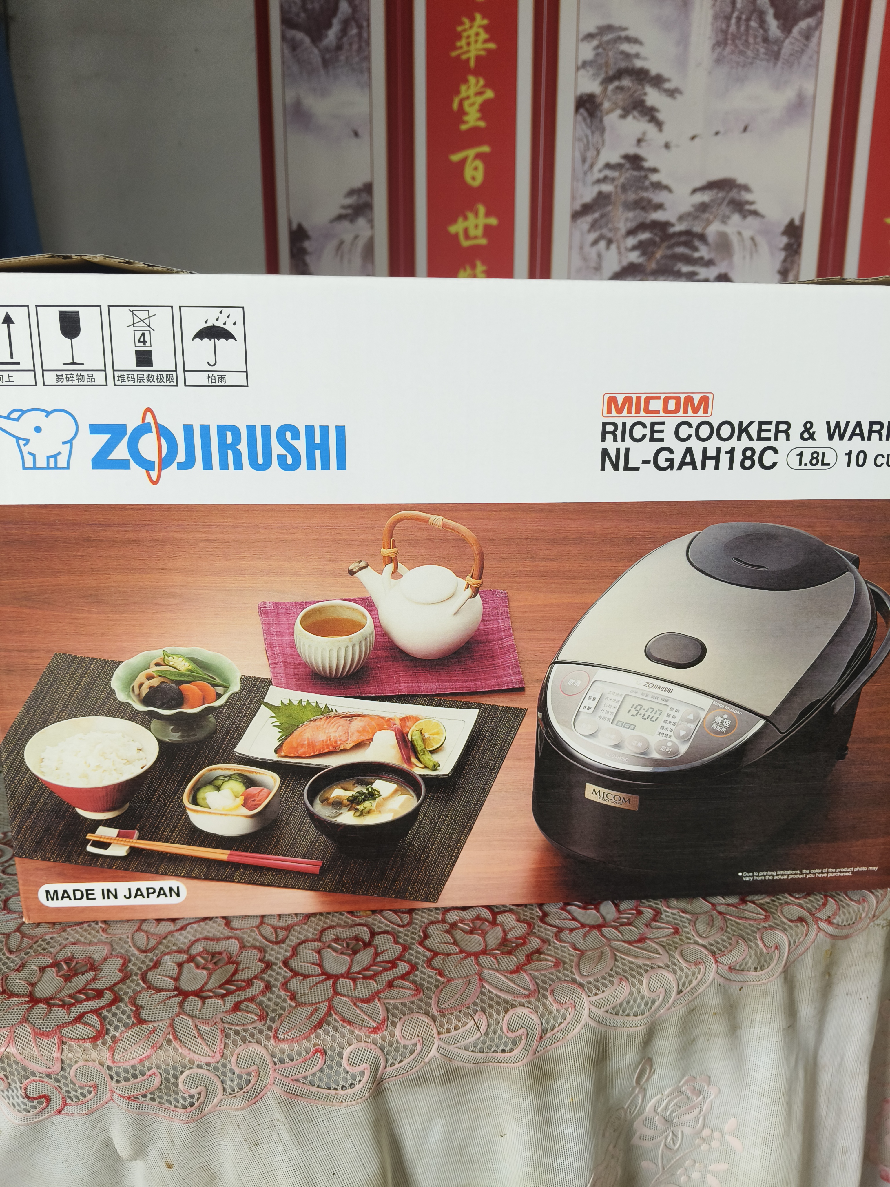 象印（ZO JIRUSHI）日本进口电饭锅微电脑家用电饭煲预约定时蒸格蒸煮黑内釜内胆不粘锅5L（6-10人） 实拍图