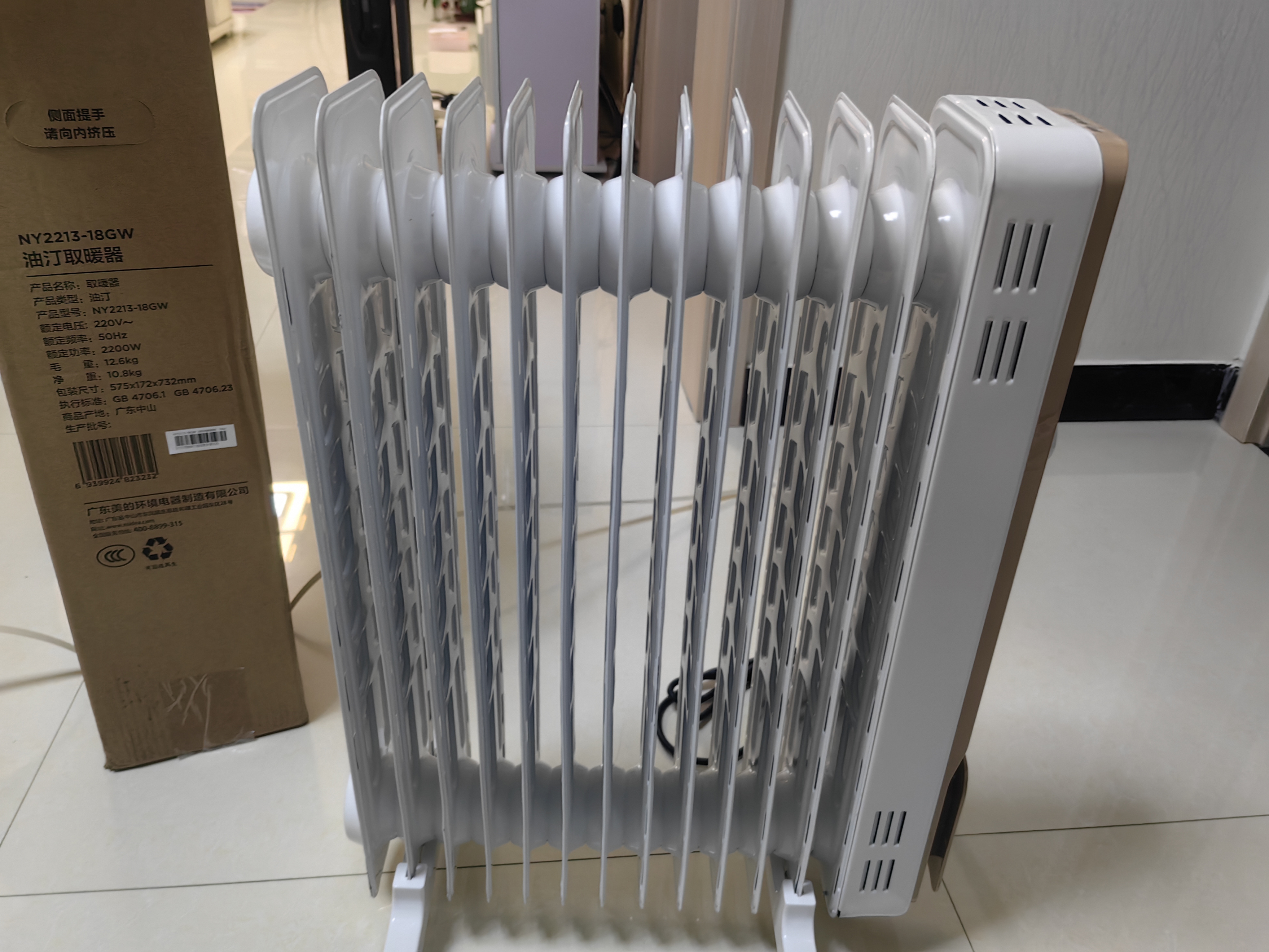 美的（Midea）取暖器电油汀家用电暖器片13片油丁防烫电暖气片办公室卧室全屋升温 13片 机械式 高效恒温 实拍图