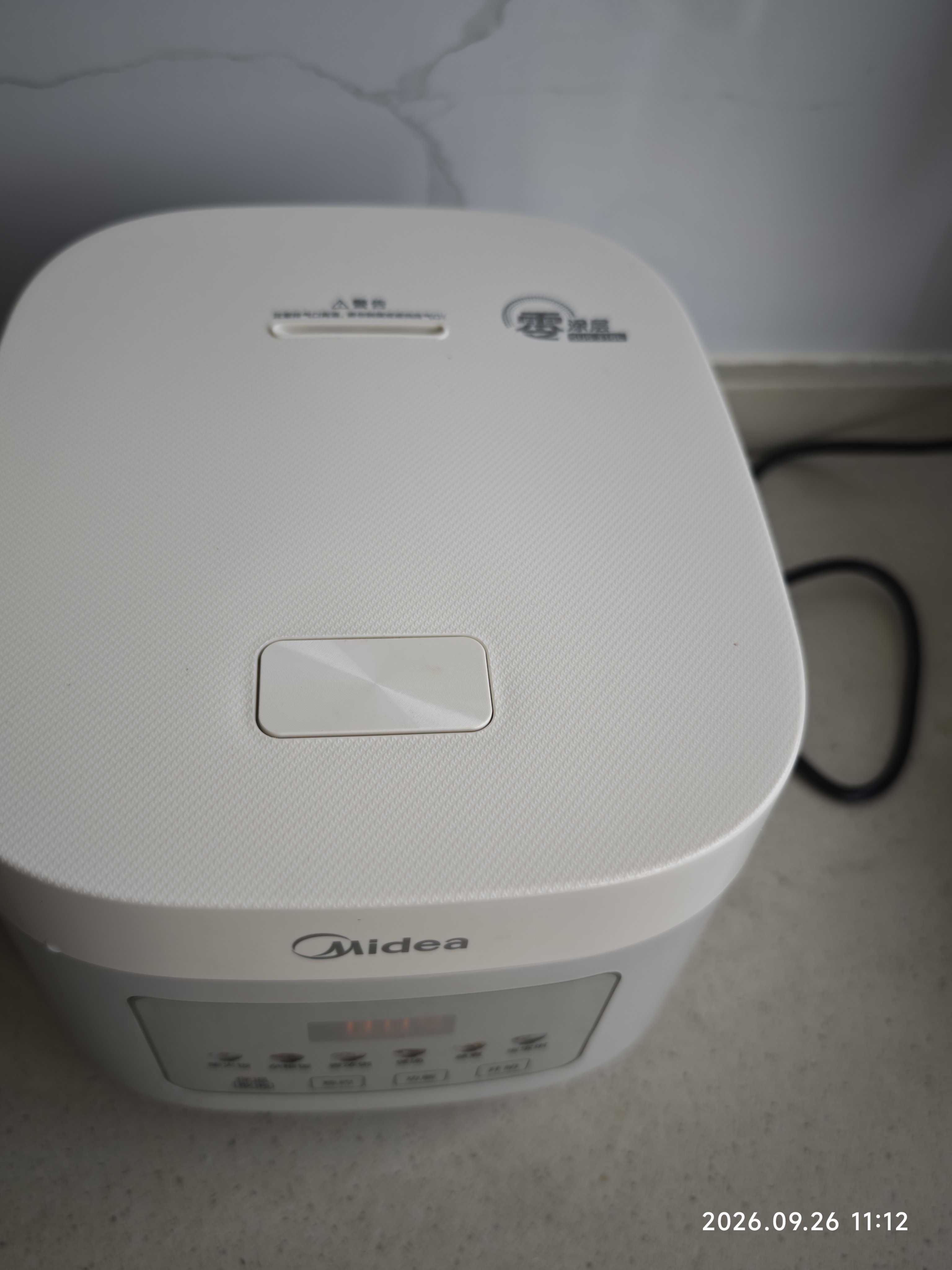 美的（Midea）电饭煲 3L家用电饭锅 316L不锈钢无涂层煮饭锅 2-3人智能预约0涂层煲汤煮粥MB-RE387S 实拍图