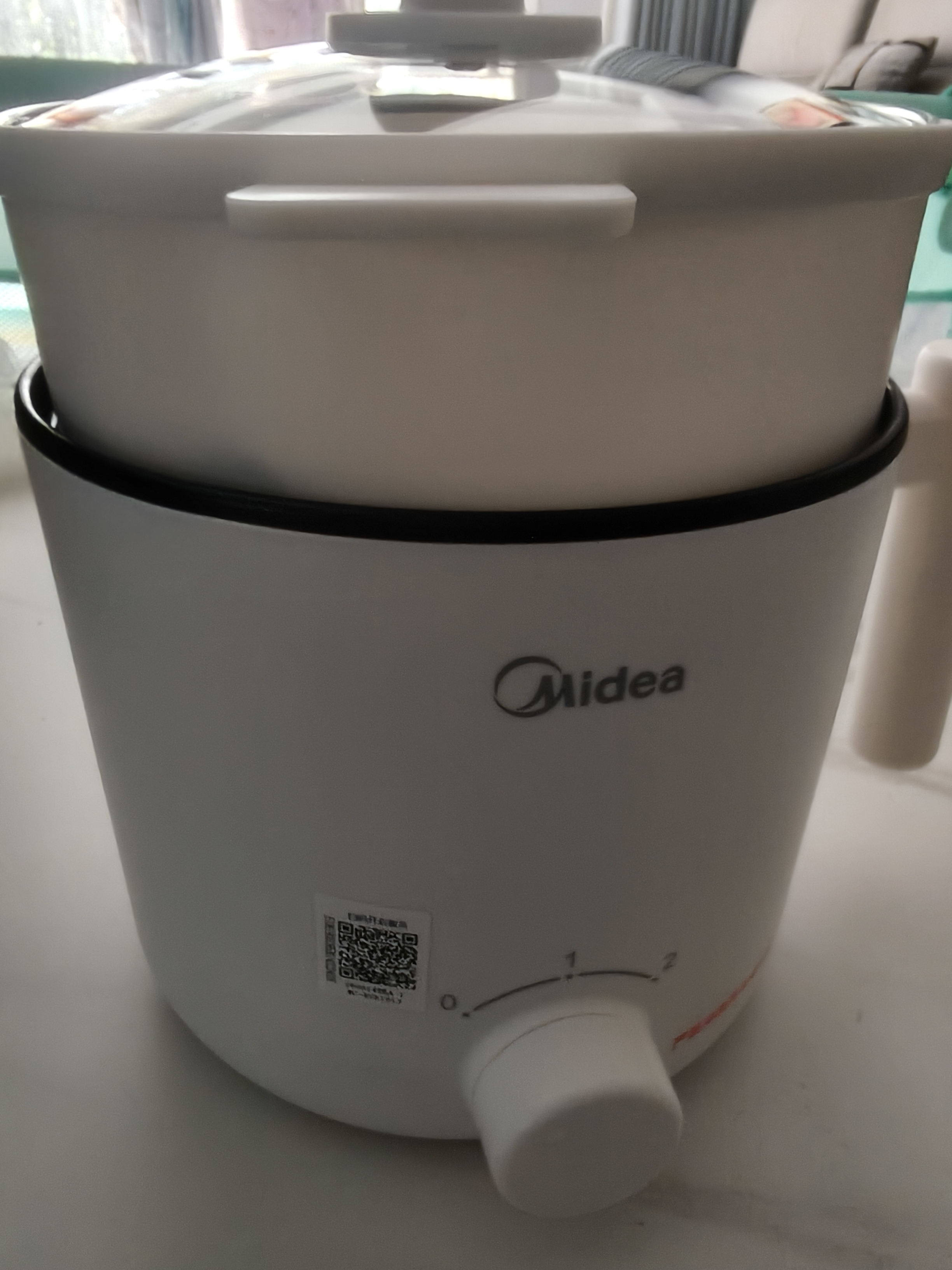 美的（Midea）电煮锅 宿舍小电锅 电蒸锅 学生寝室一体泡面小火锅电煮锅 多功能锅 电热锅 XZE1613 配蒸笼 1.7L 实拍图