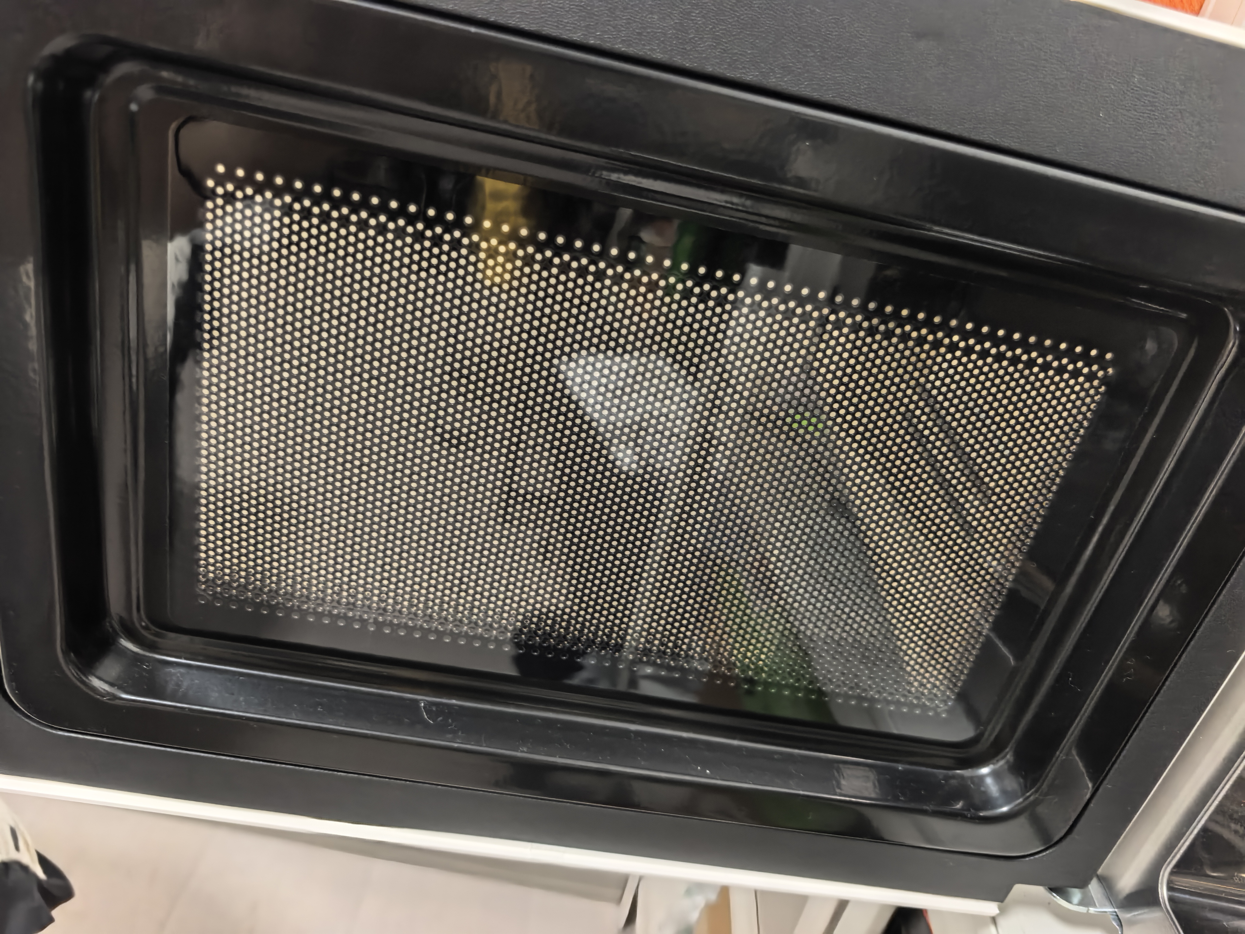 海尔（Haier）白巧不锈钢微波炉 0涂层360°转盘加热 旋转操作易洁耐用内胆 家用小型 老人适用 HW-M2003JW 实拍图