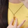 中国黄金（CHINA GOLD）黄金躲猫猫铃兰花喵吊坠女款足金首饰品情人节生日礼物送女友老婆 躲猫猫招财金喵项链【咖绳】约0.65g 实拍图