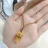 中国黄金（CHINA GOLD）黄金躲猫猫铃兰花喵吊坠女款足金首饰品情人节生日礼物送女友老婆 躲猫猫招财金喵项链【咖绳】约0.65g 实拍图