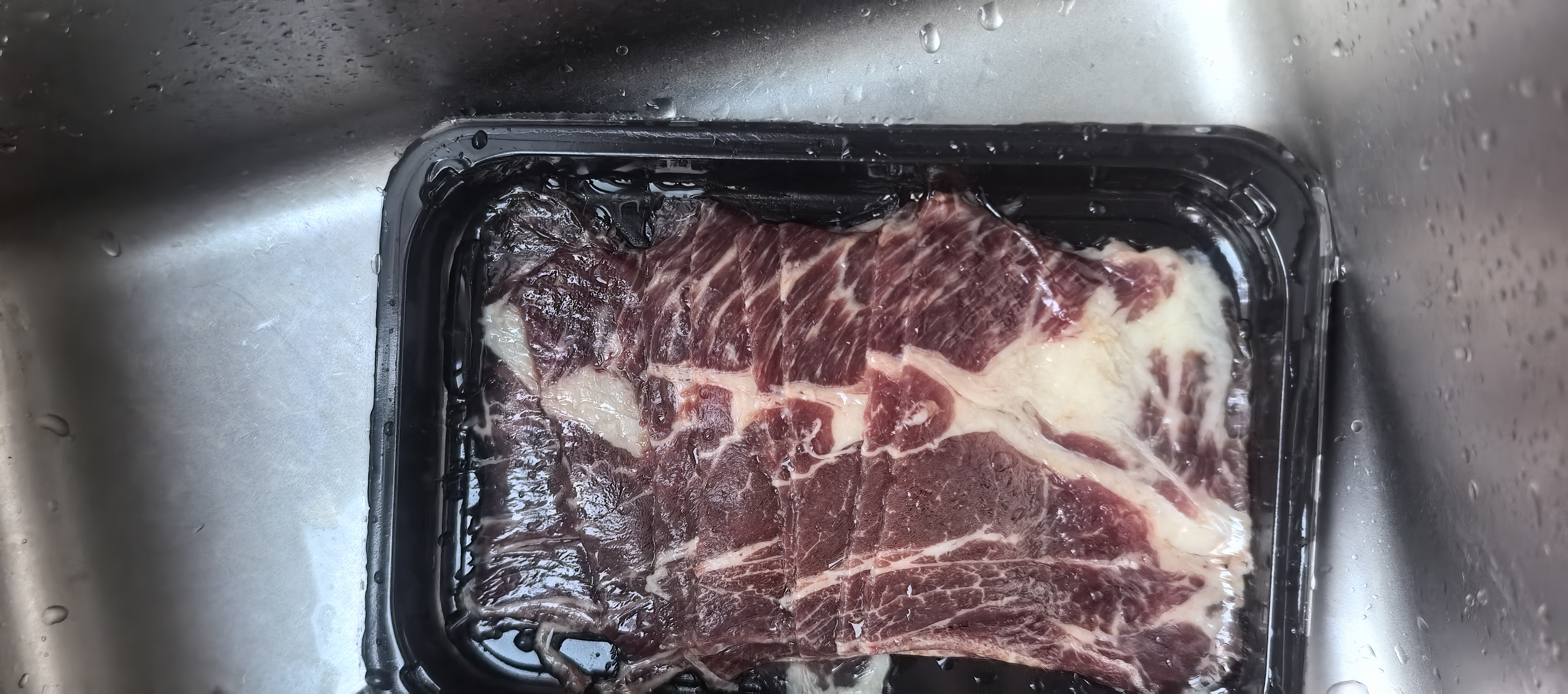京牛倌 澳洲和牛M5原切牛肉片 净重两斤 谷饲雪花肥牛片卷火锅烤肉食材 实拍图