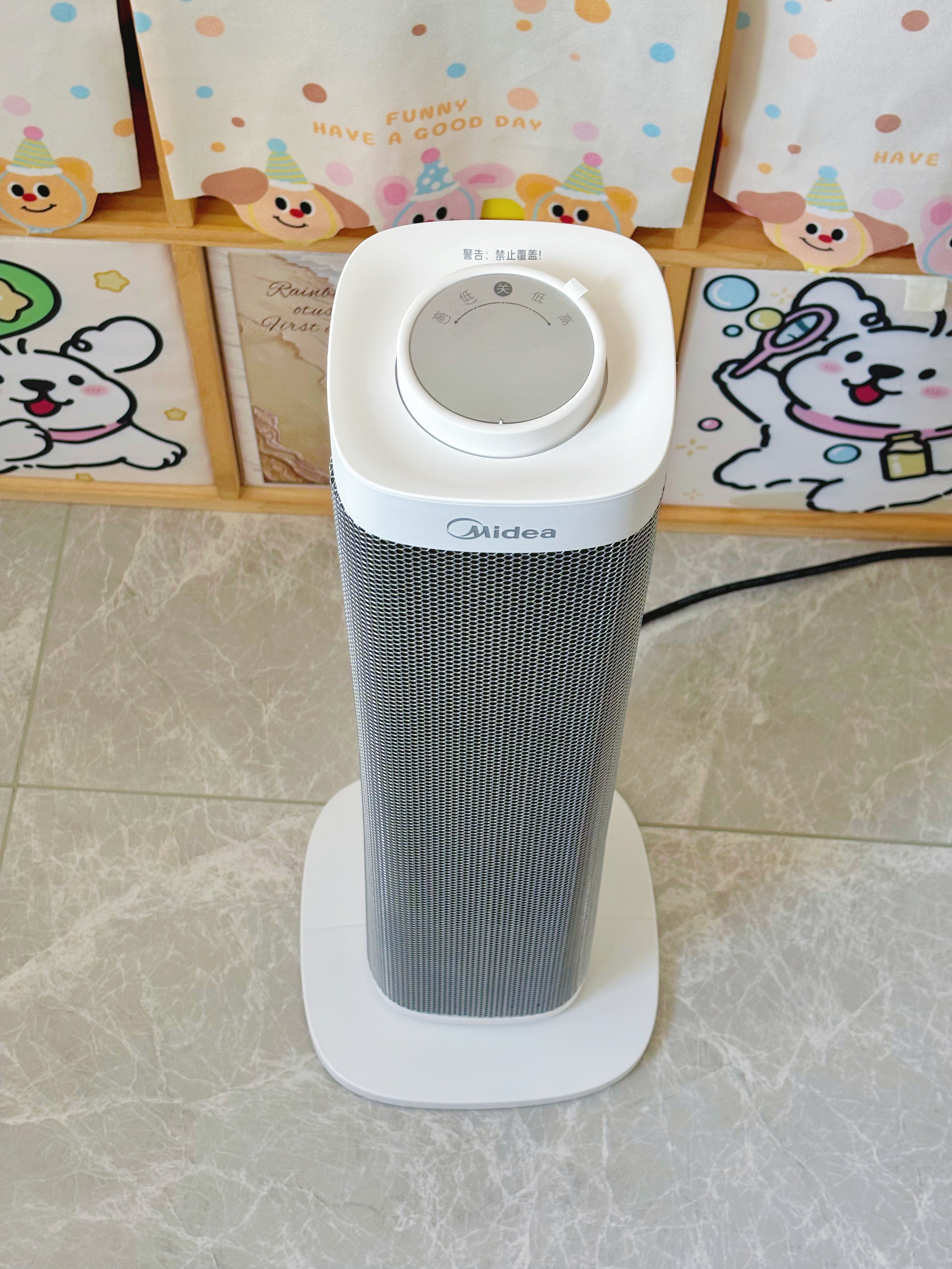 美的（Midea）取暖器立式暖风机电暖气家用电暖器小太阳烤火器浴室热风机节能大功率新款低噪办公室卧室速热干衣 【热销爆款】新型石墨烯 实拍图