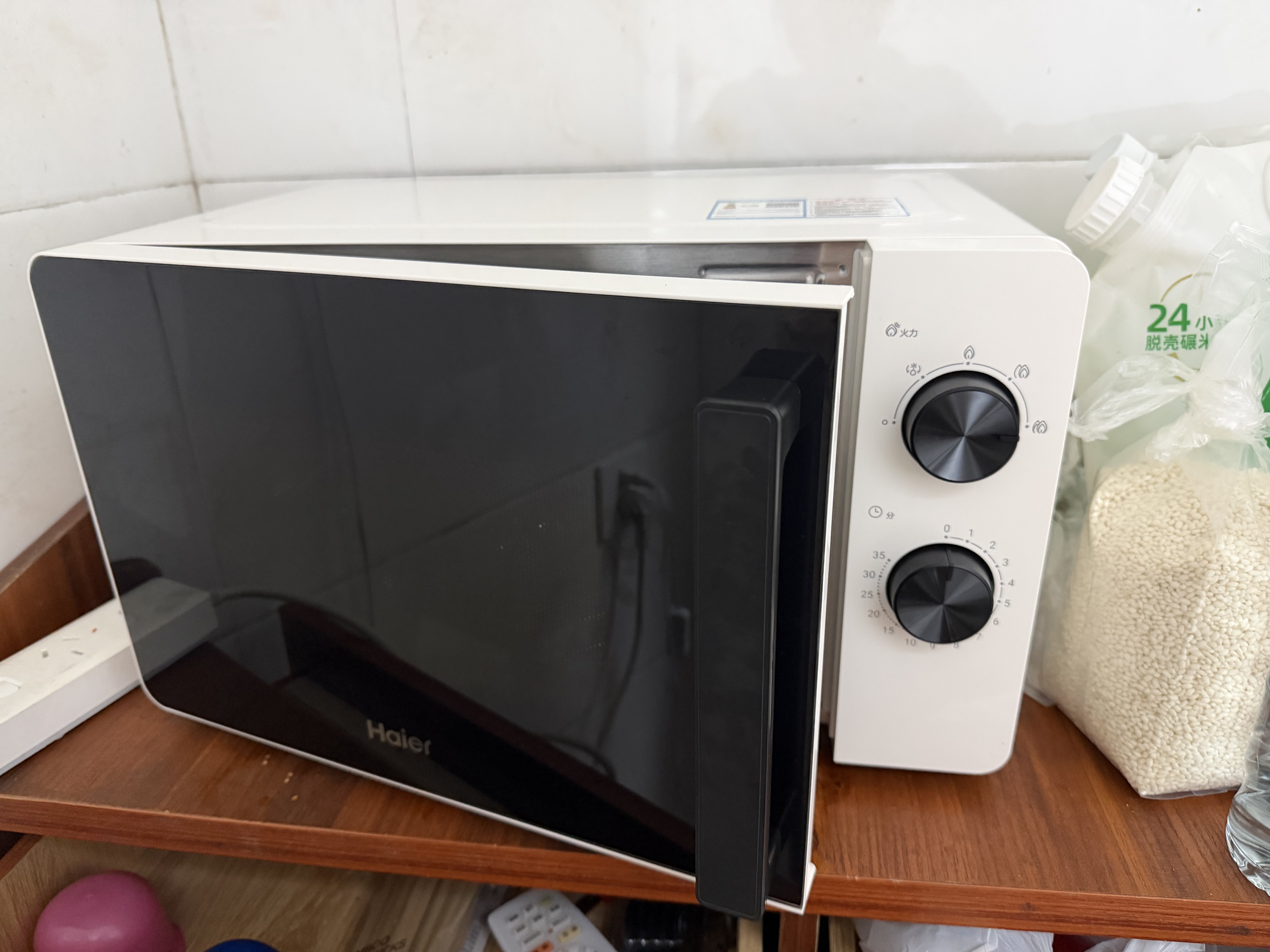 海尔（Haier）白巧不锈钢微波炉 0涂层360°转盘加热 旋转操作易洁耐用内胆 家用小型 老人适用 HW-M2003JW 实拍图