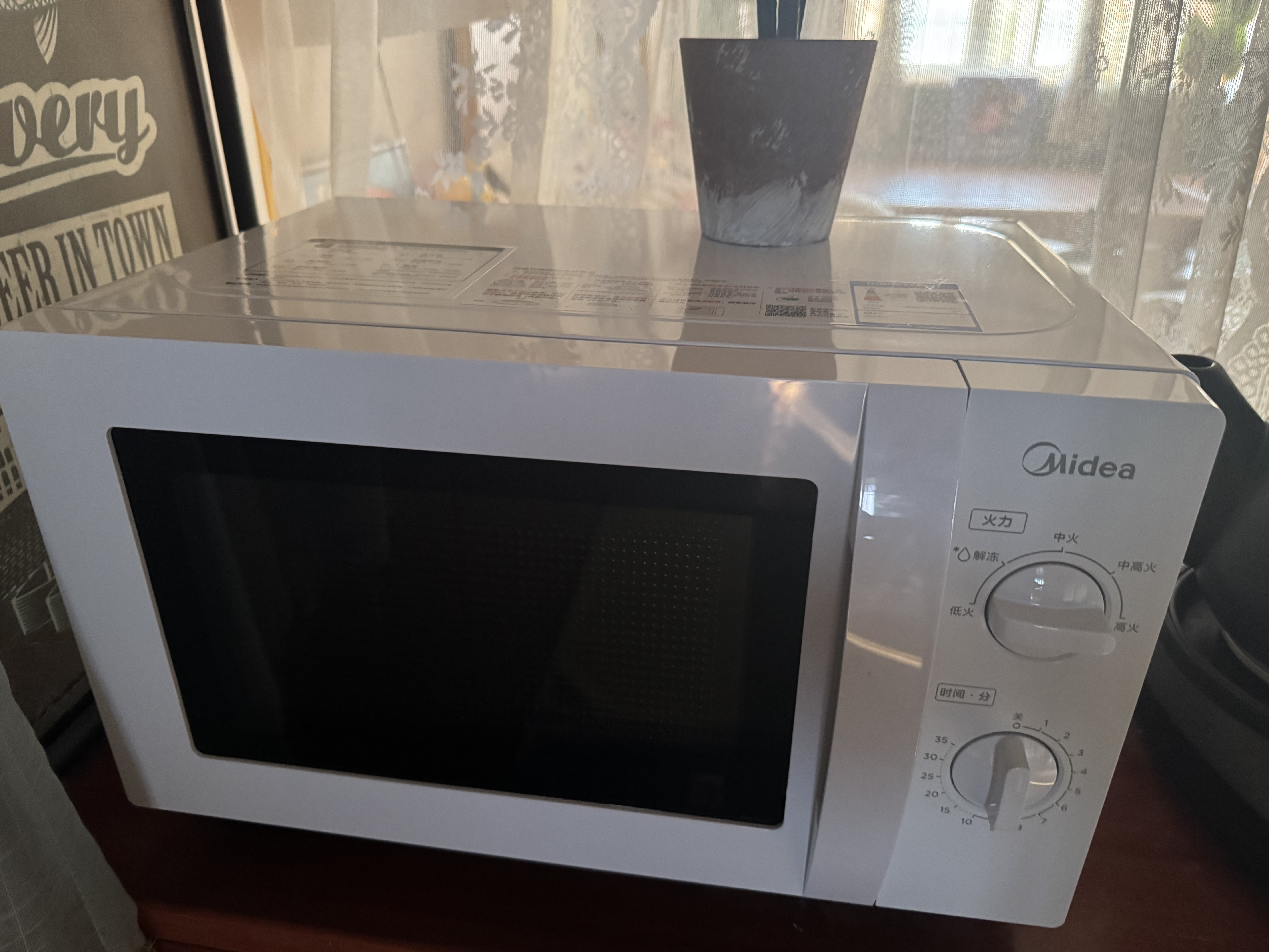 美的微波炉家用小型20升平板式易清洁 老人轻松上手简易双旋钮单微波炉 五档火力调节 700W速热 【2026新款】百搭白色 实拍图