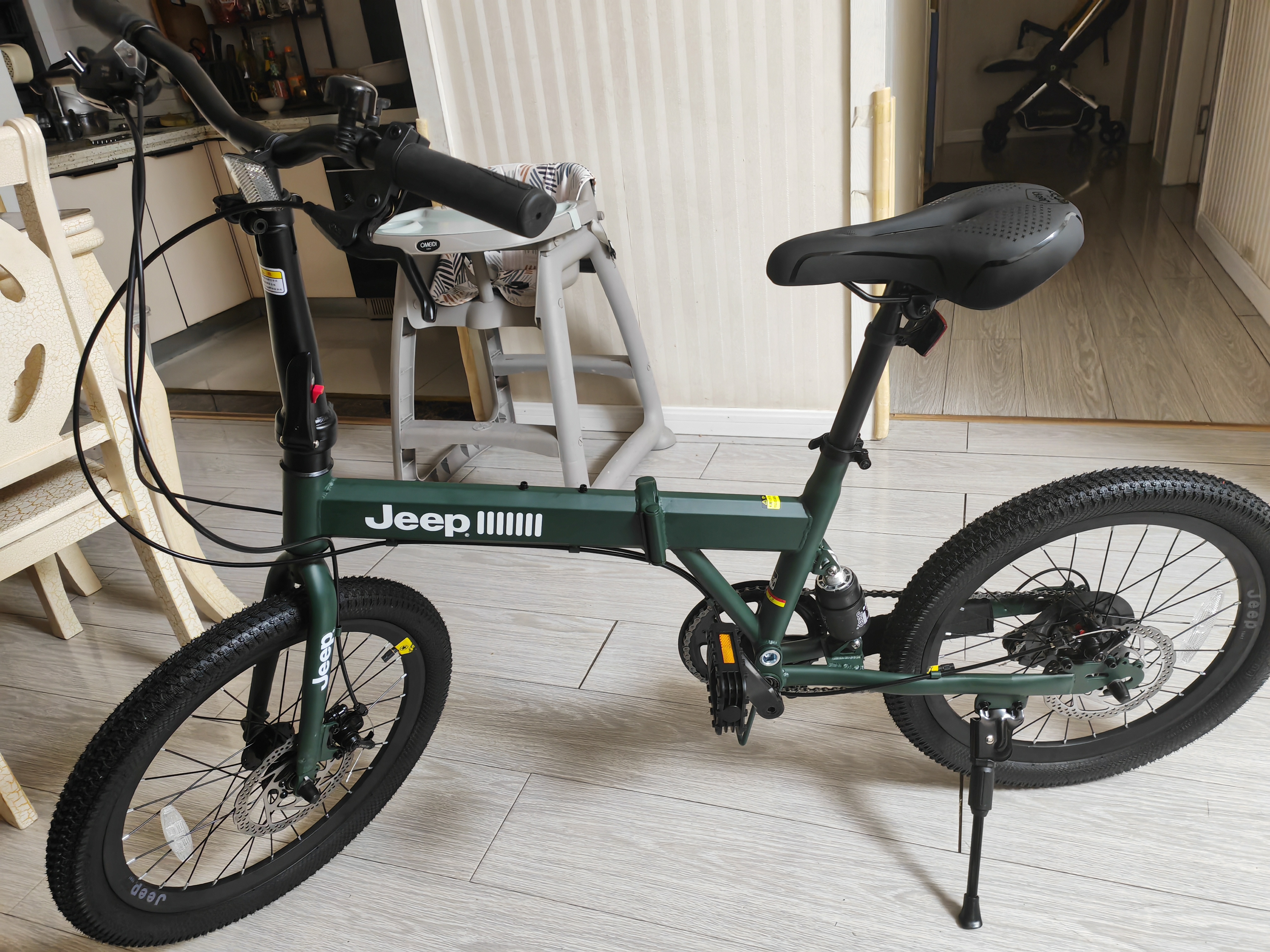 JEEP 吉普(JEEP)山地自行车男女公路车学生折叠减震城市车变速-飞虎 【车+宝宝座椅】飞虎-20寸-辐条轮-军绿色 7速二代升级版（禧玛诺变速） 实拍图