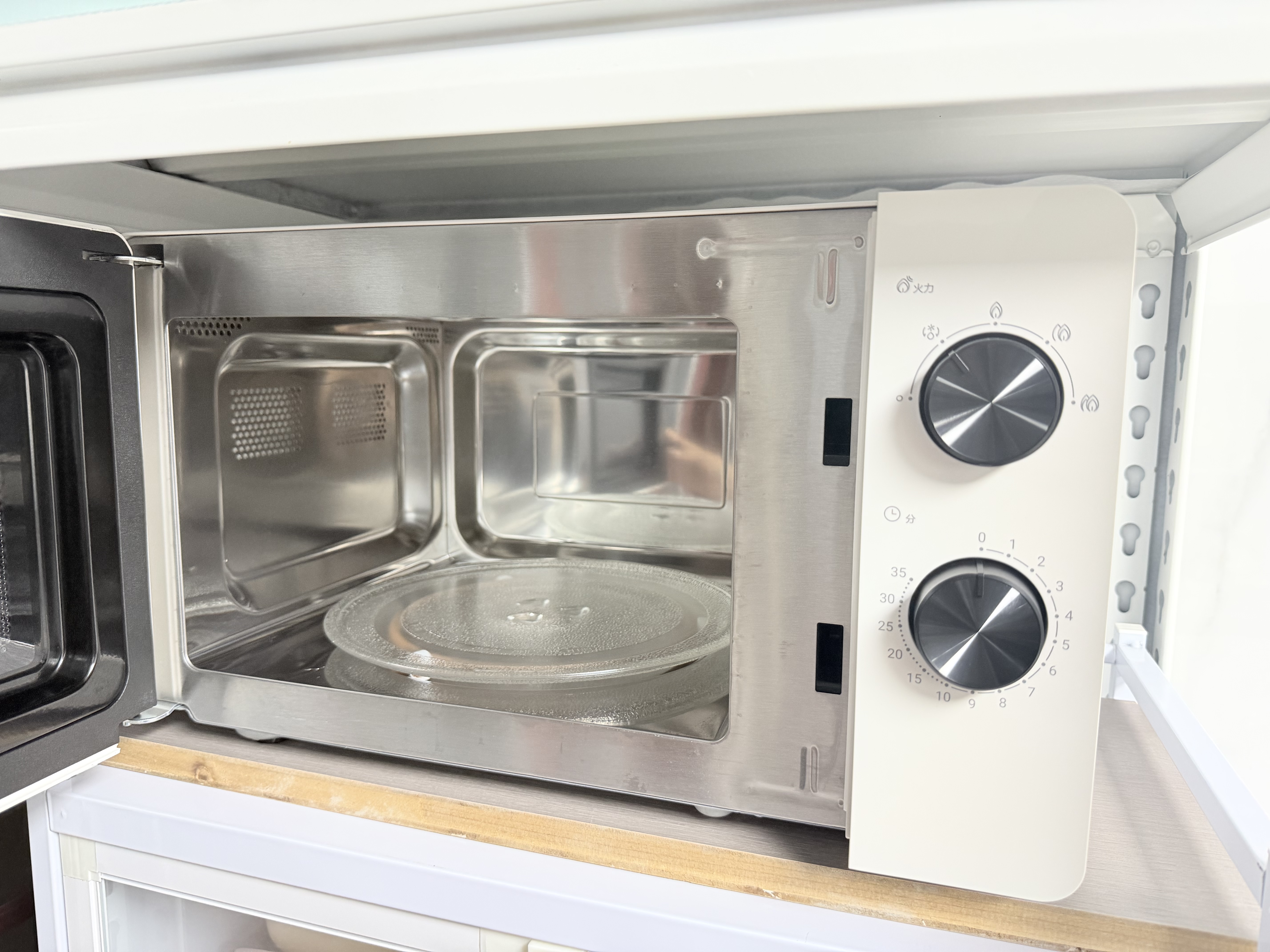 海尔（Haier）白巧不锈钢微波炉 0涂层360°转盘加热 旋转操作易洁耐用内胆 家用小型 老人适用 HW-M2003JW 实拍图