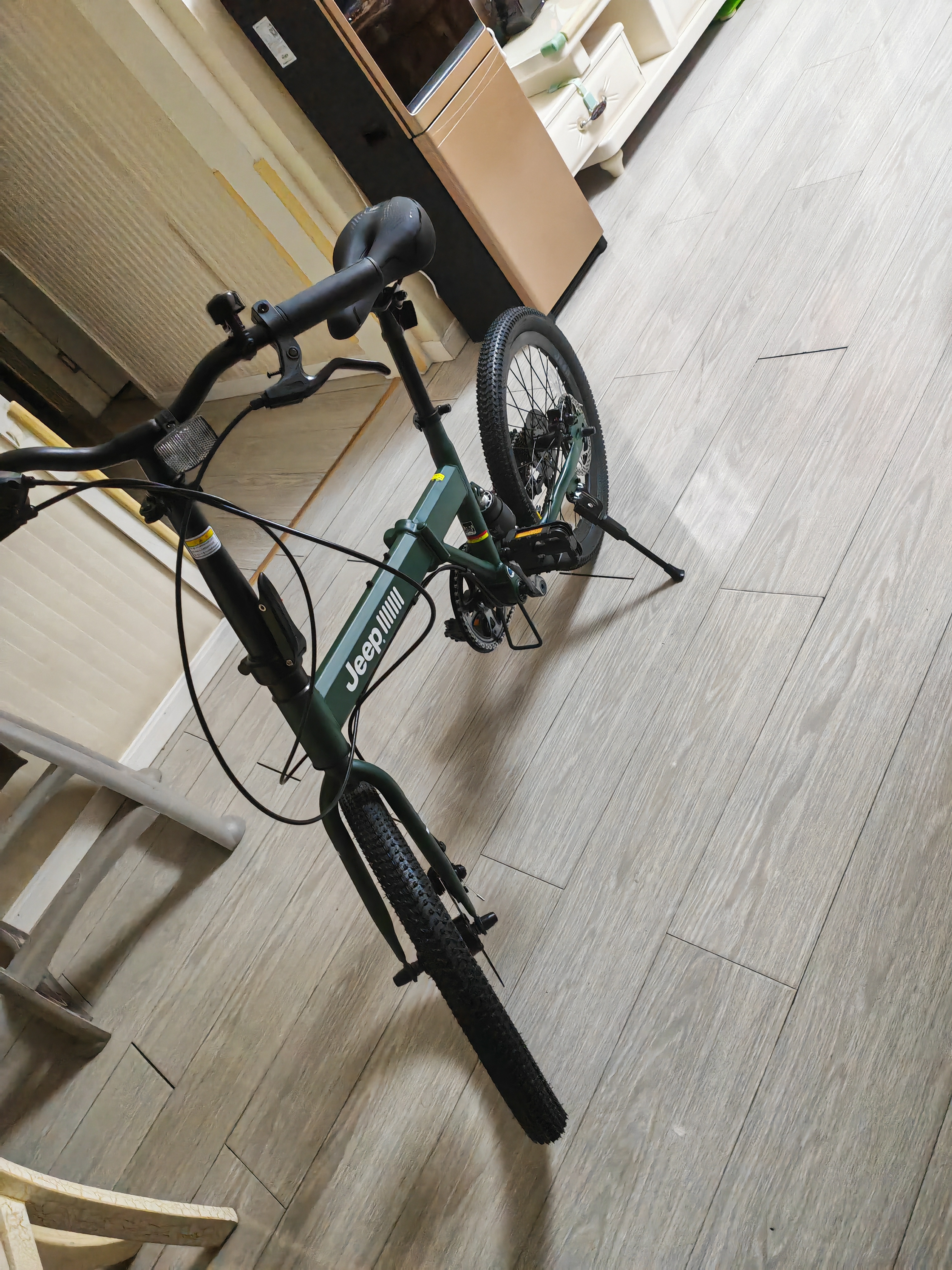 JEEP 吉普(JEEP)山地自行车男女公路车学生折叠减震城市车变速-飞虎 【车+宝宝座椅】飞虎-20寸-辐条轮-军绿色 7速二代升级版（禧玛诺变速） 实拍图