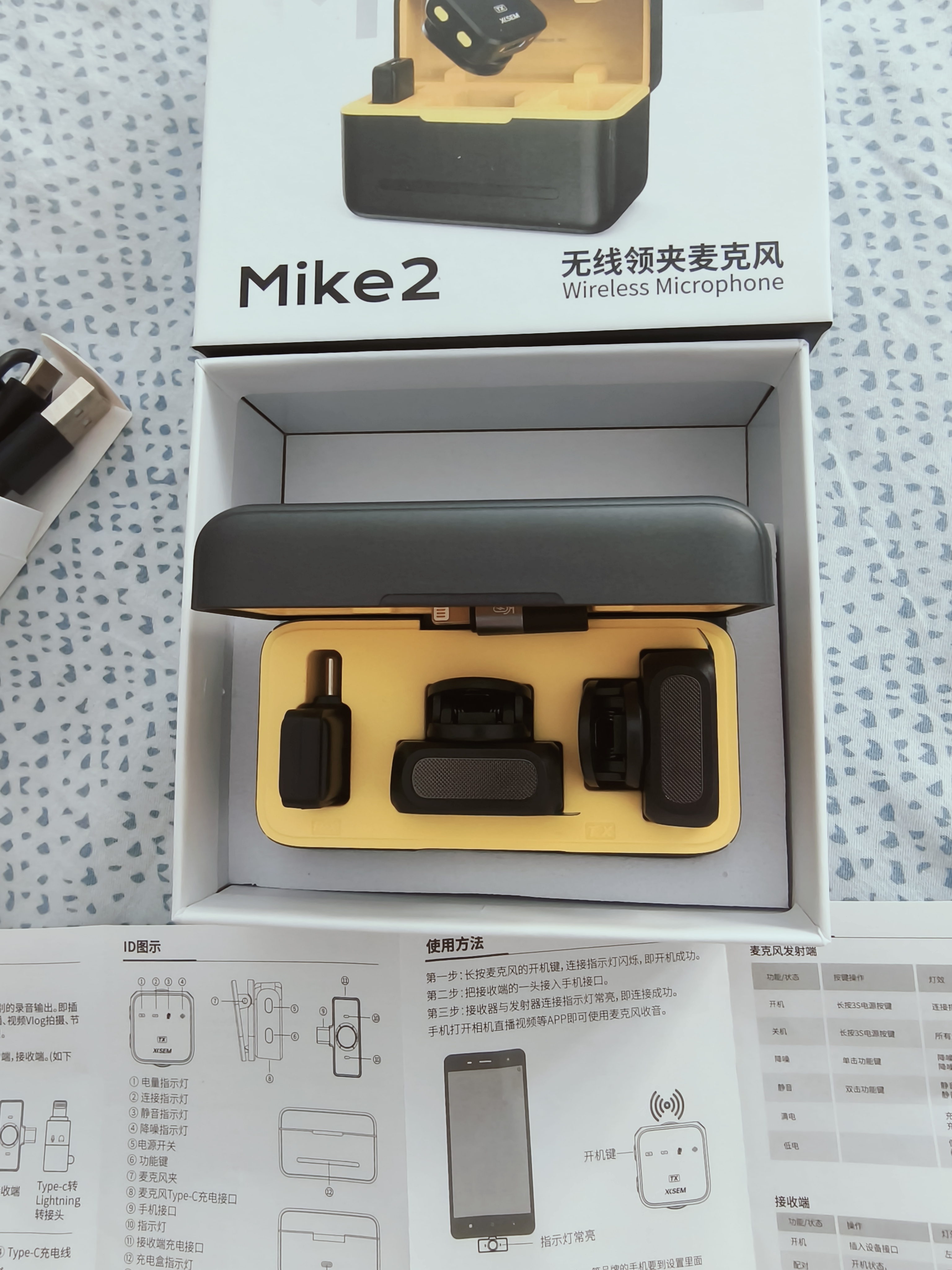 西圣（XISEM）Mike2新升级无线麦克风夹领式一拖二直播设备降噪拍视频录音专用收音纽扣式领夹麦克风 Mike2 安卓苹果通用【一拖二配充电仓】黑色 实拍图
