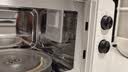 海尔（Haier）白巧不锈钢微波炉 0涂层360°转盘加热 旋转操作易洁耐用内胆 家用小型 老人适用 HW-M2003JW 实拍图