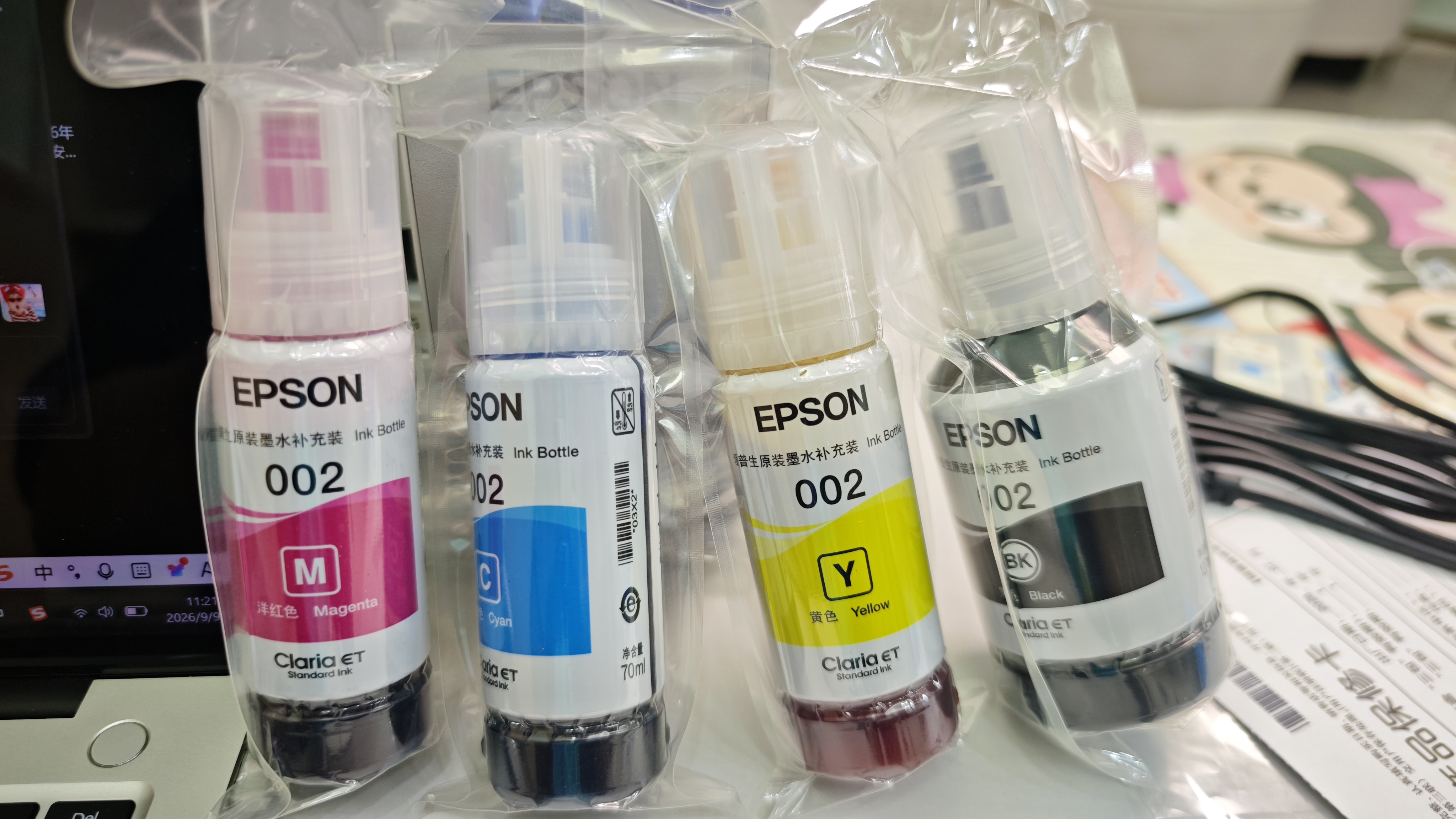 爱普生(EPSON)002系列原装墨水黄色(((适用L426X/L626X/L627X/L629X/L415X/L416X/L616X/L617X系列等) 实拍图