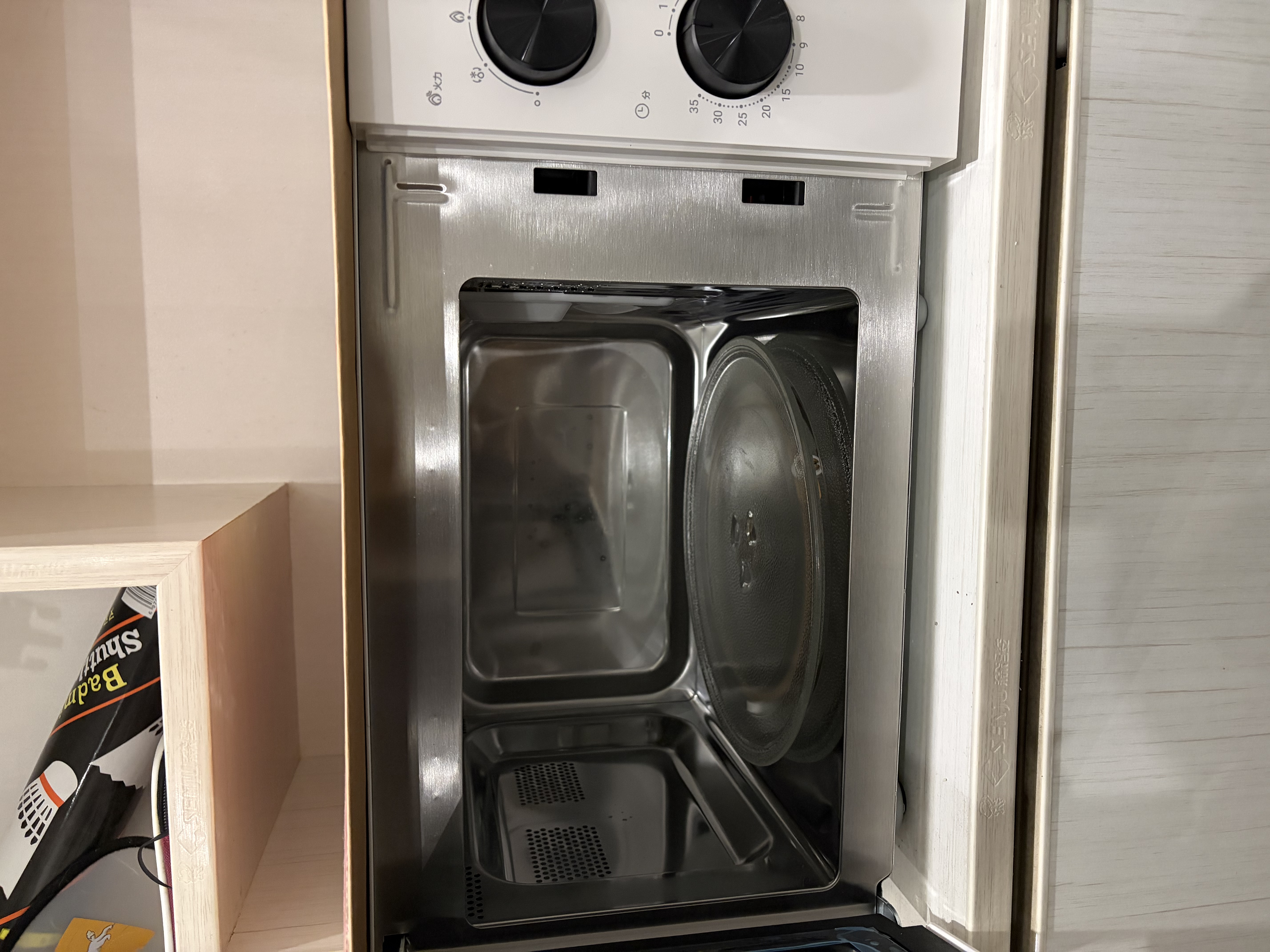 海尔（Haier）白巧不锈钢微波炉 0涂层360°转盘加热 旋转操作易洁耐用内胆 家用小型 老人适用 HW-M2003JW 实拍图
