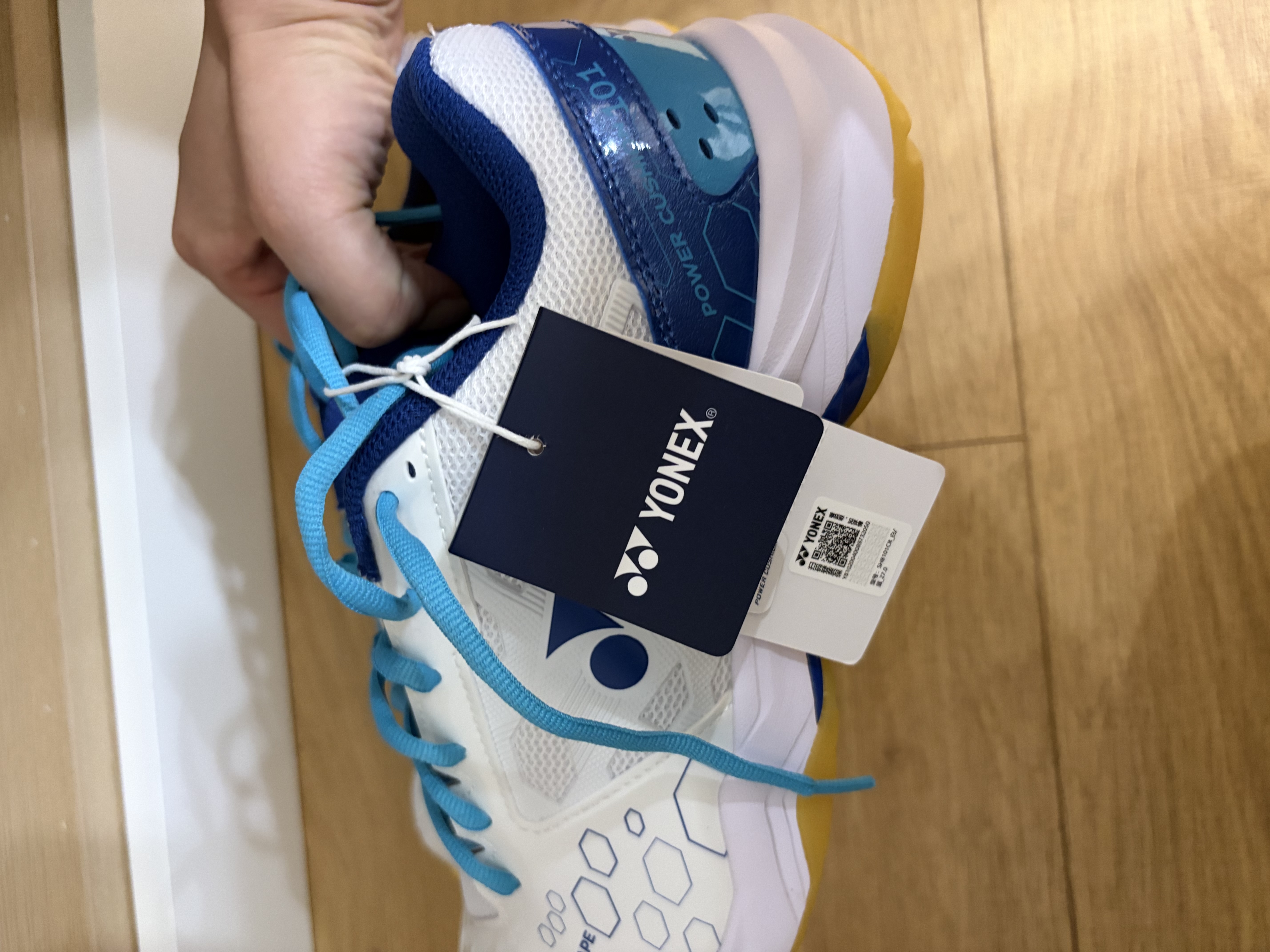 尤尼克斯（YONEX）羽毛球鞋yy入门级训练减震动力垫男女SHB101CR 白/蓝42码 实拍图