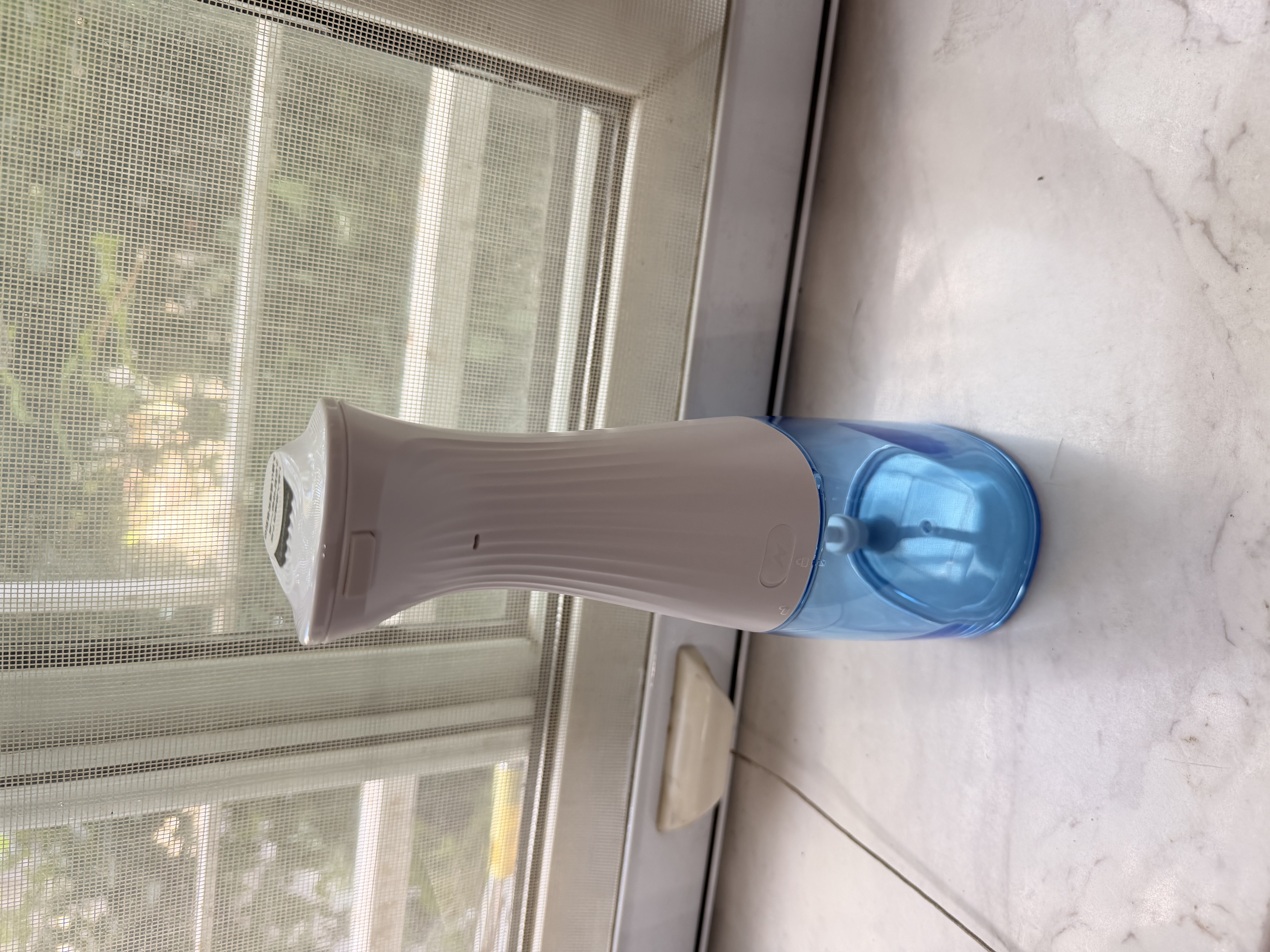 美的（Midea）冲牙器高频脉冲清洁牙缝可拆大水箱便携式长续航4模式4喷头家用旅行正畸适用MC-BJ0102节日礼物 实拍图