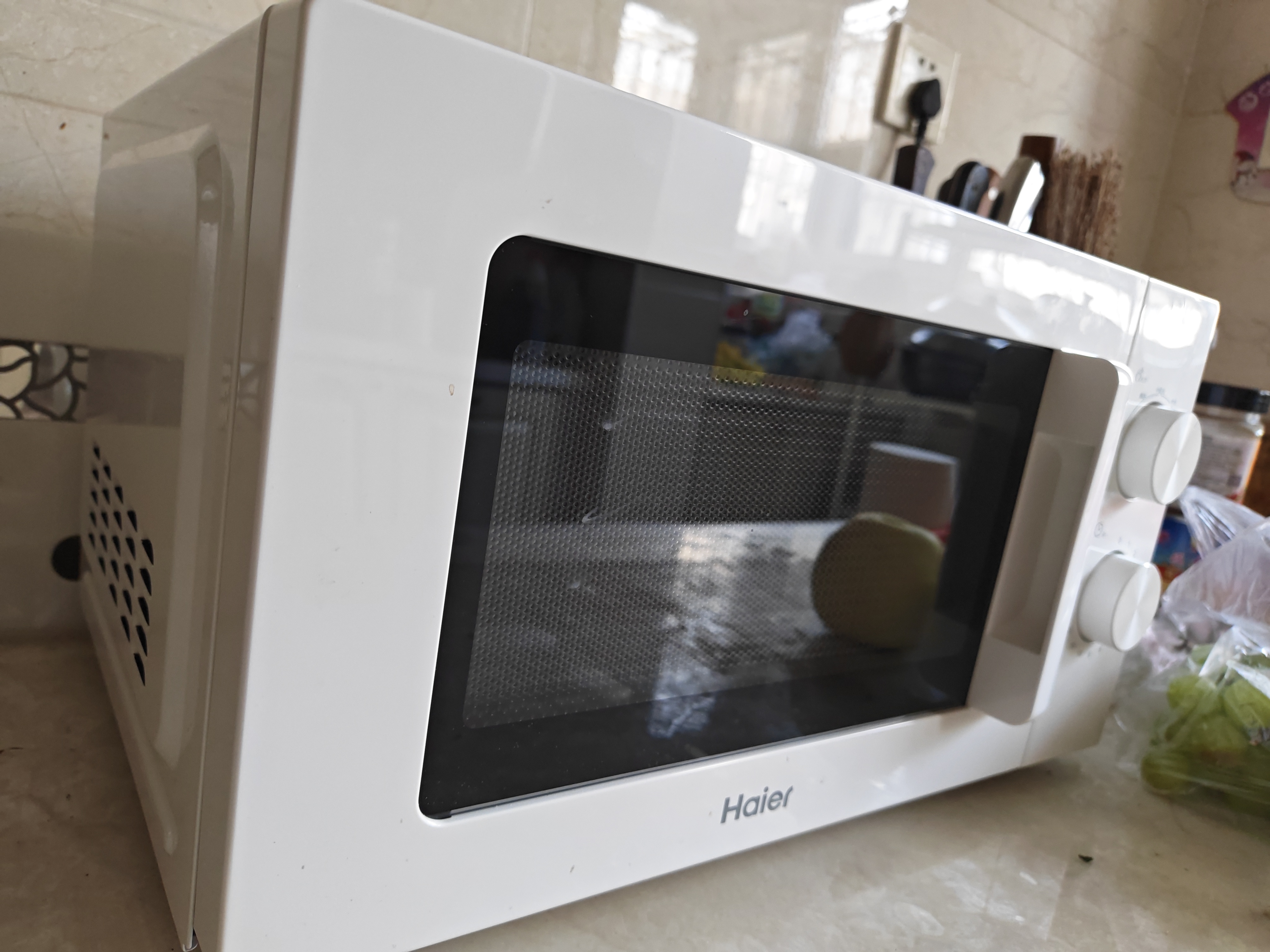 海尔（Haier）快捷微波炉家用小型 360°转盘加热 旋钮操控 易洁内胆 白色 6档火力 HW-M20J1W 实拍图