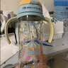 贝亲（Pigeon）防胀气 自然成长翻盖直饮吸管 大童奶瓶330ml 马戏团 18月+ AA279 实拍图