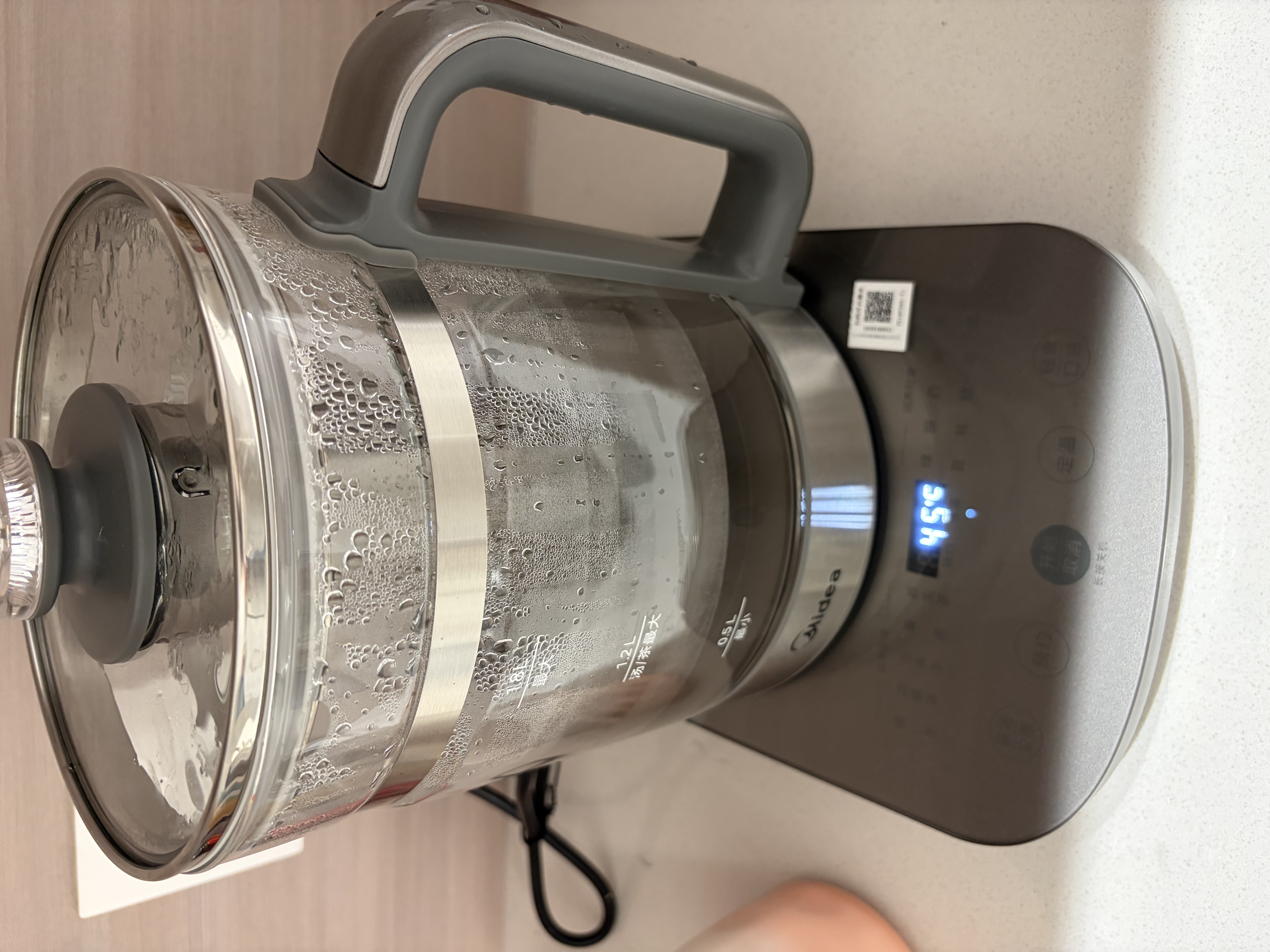 美的（Midea）纯钛养生壶 1.8L全自动大容量烧水壶纯钛茶篮 家用泡奶机电热水壶 恒温煮茶壶YS18P305-Ti 实拍图