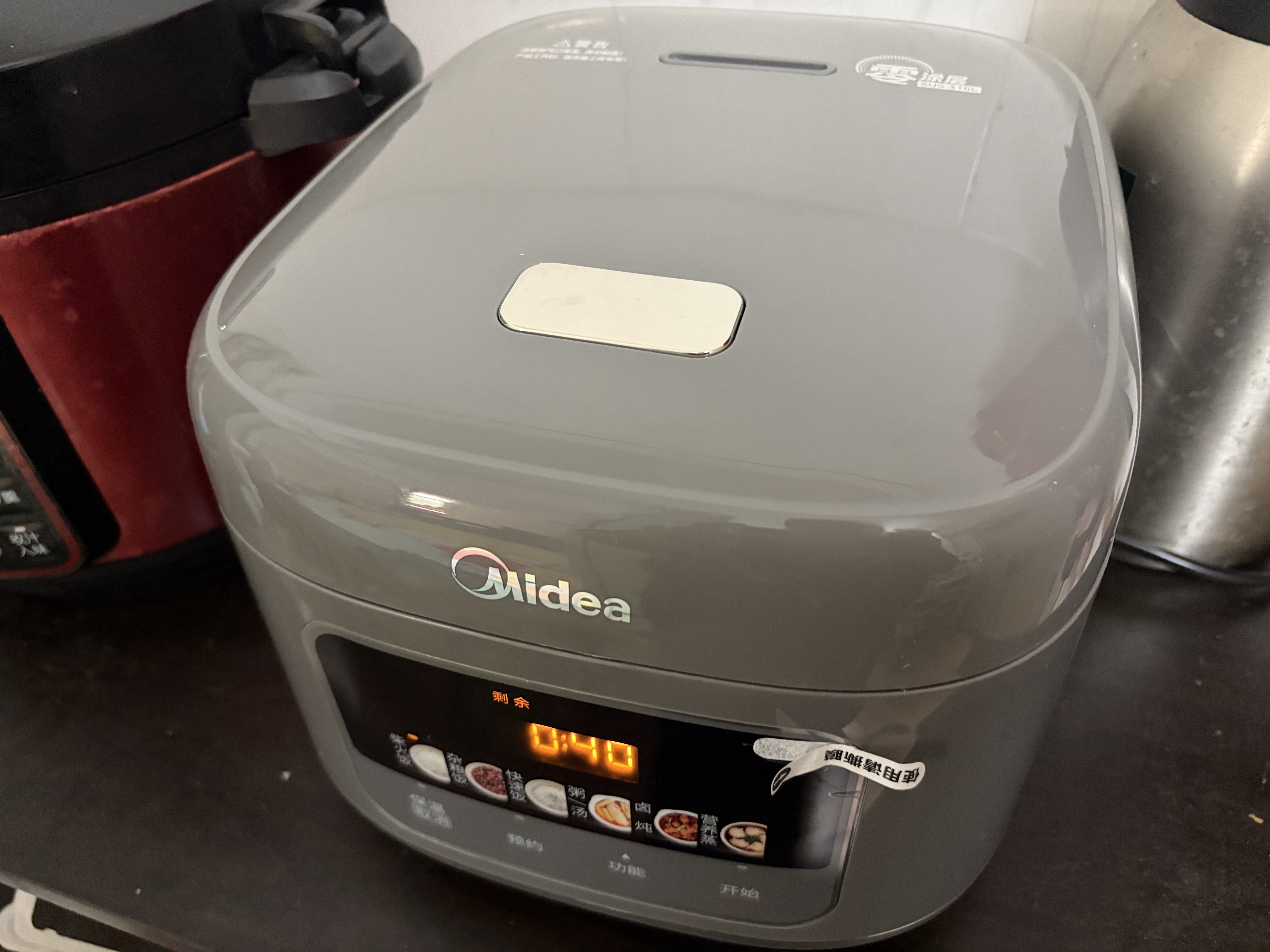 美的（Midea）大布丁0涂层电饭煲家用3-4人4升316L不锈钢内胆电饭锅防溢杂粮饭柴火饭多功能无涂层微压锅RE487S 实拍图
