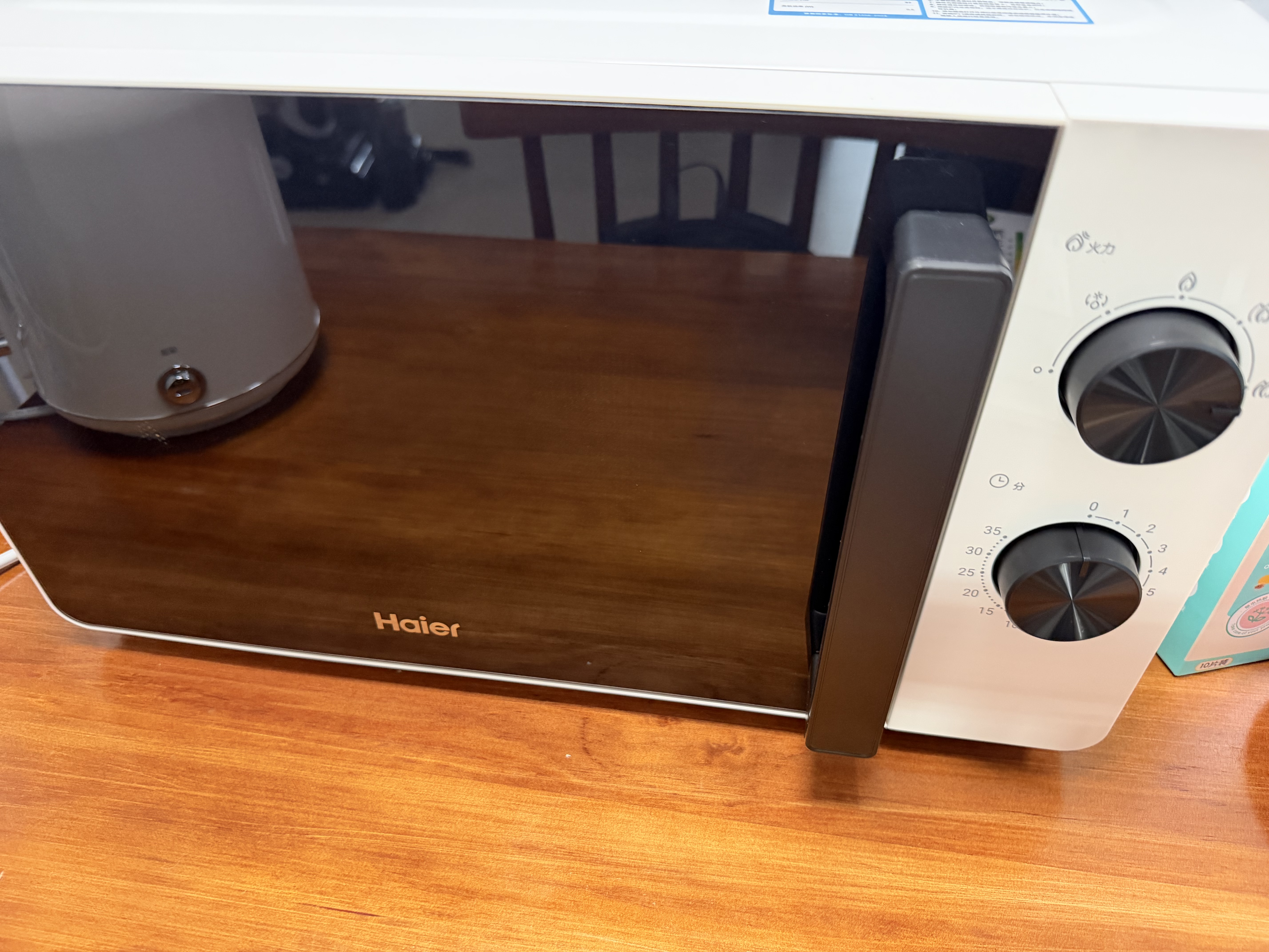 海尔（Haier）白巧不锈钢微波炉 0涂层360°转盘加热 旋转操作易洁耐用内胆 家用小型 老人适用 HW-M2003JW 实拍图