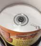 啄木鸟 DVD-R 盘面可打印系列16速 4.7G光盘/刻录光盘/空白光盘/刻录碟片 桶装50片 刻录盘 实拍图